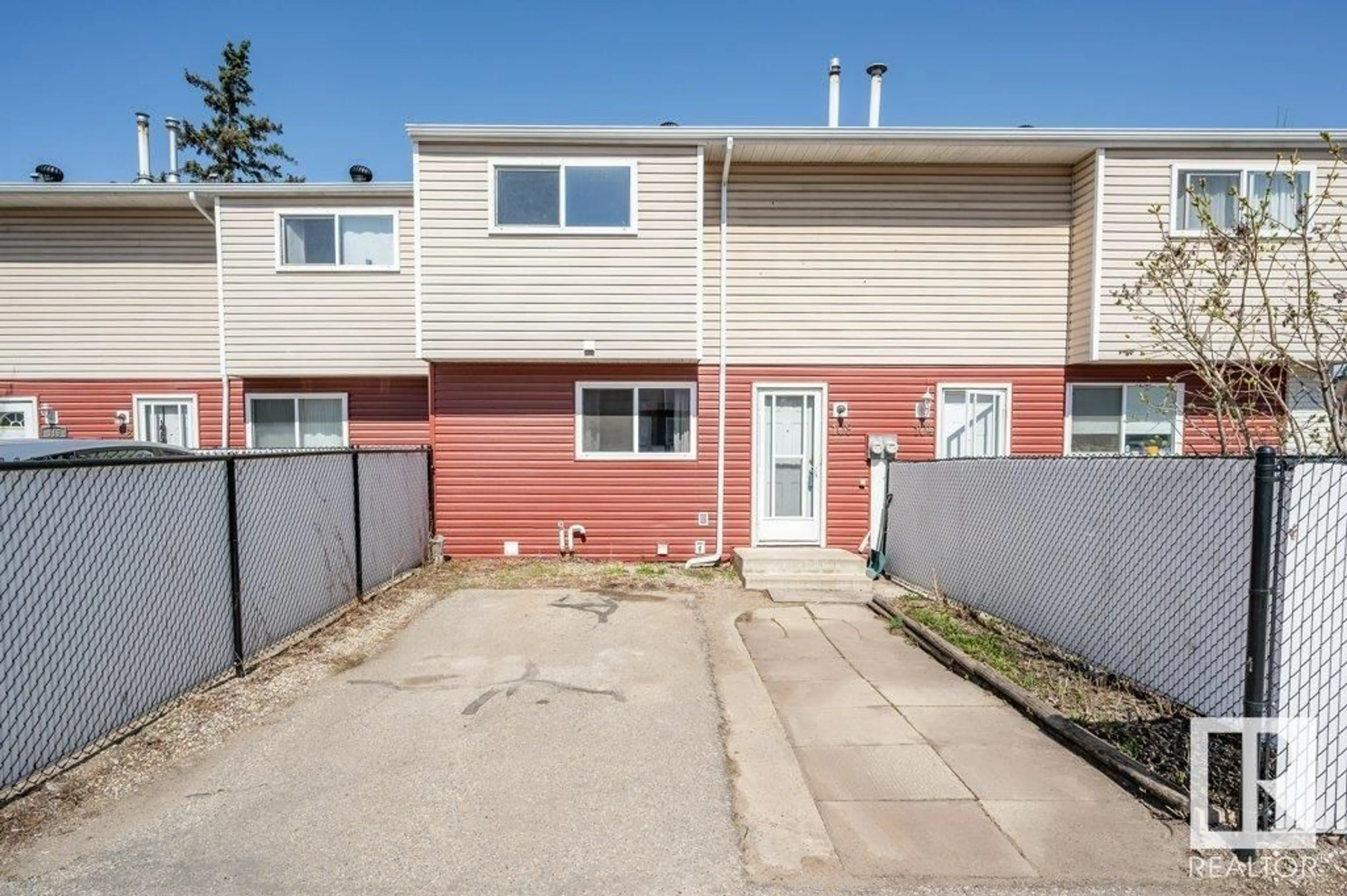 Home with vinyl exterior material, street for 108 HABITAT NW, Edmonton Alberta T5A2X7