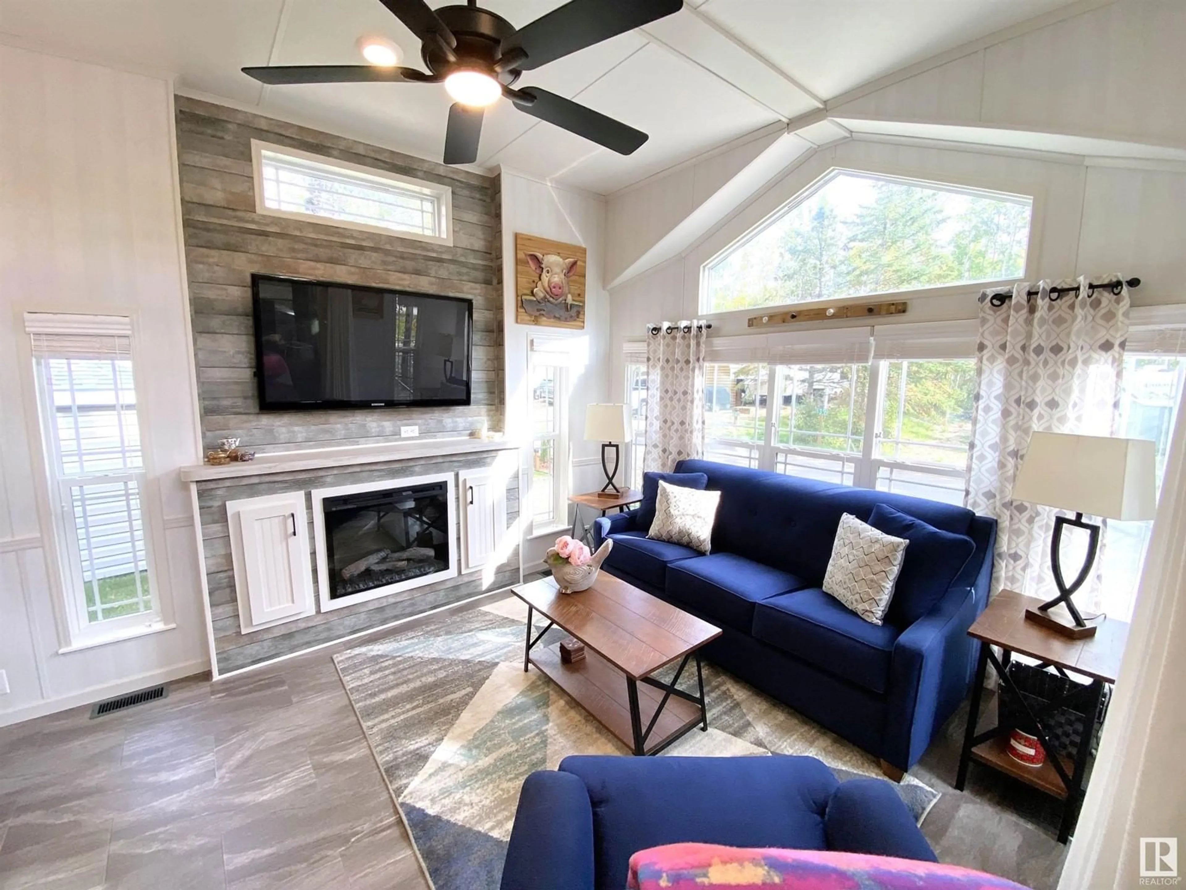 Living room with furniture, ceramic/tile floor for #504 - 53509 RGE ROAD 60, Rural Parkland County Alberta T0E1H0