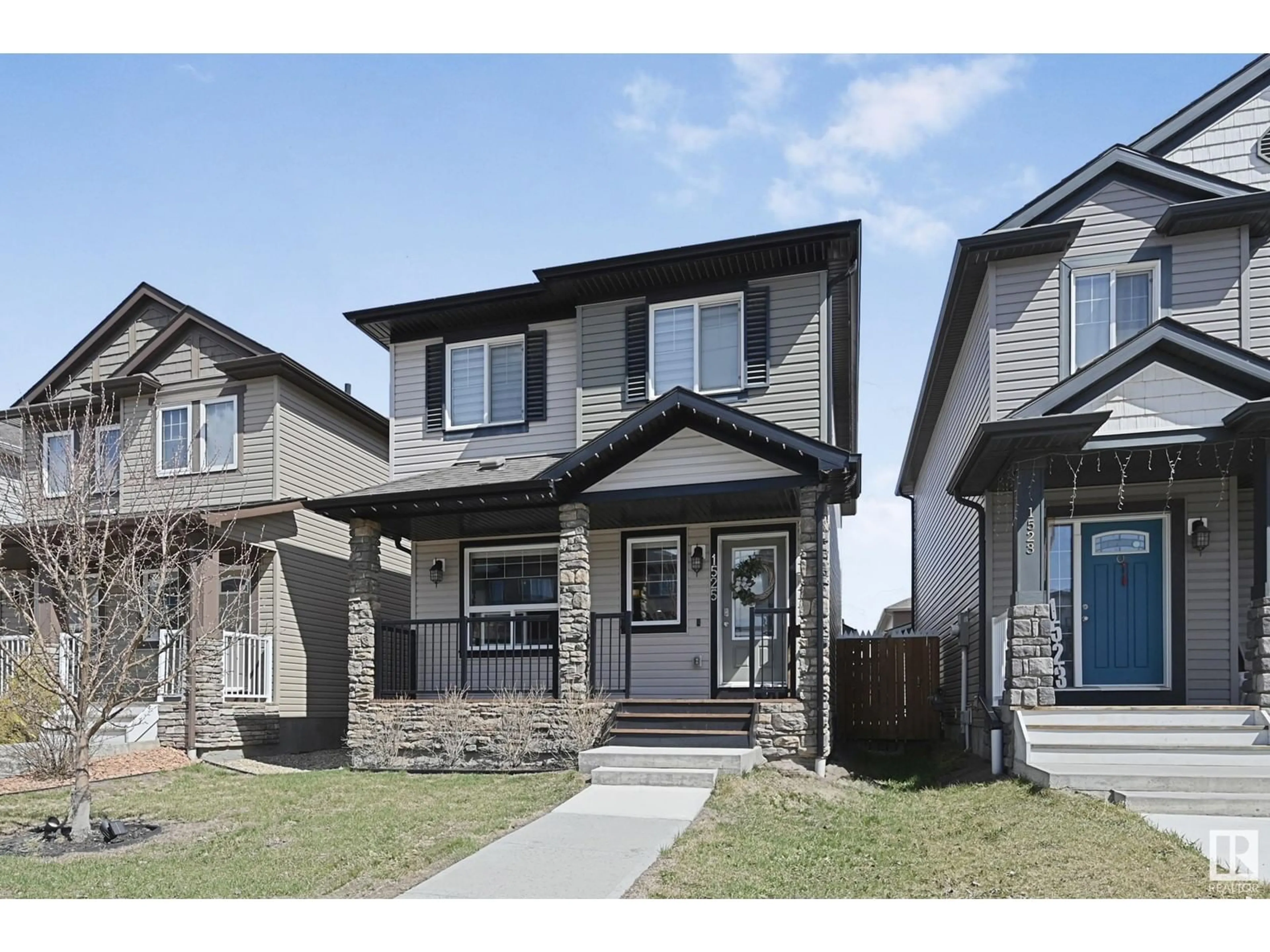 Home with vinyl exterior material, street for 1525 TAMARACK BV, Edmonton Alberta T6T2E3