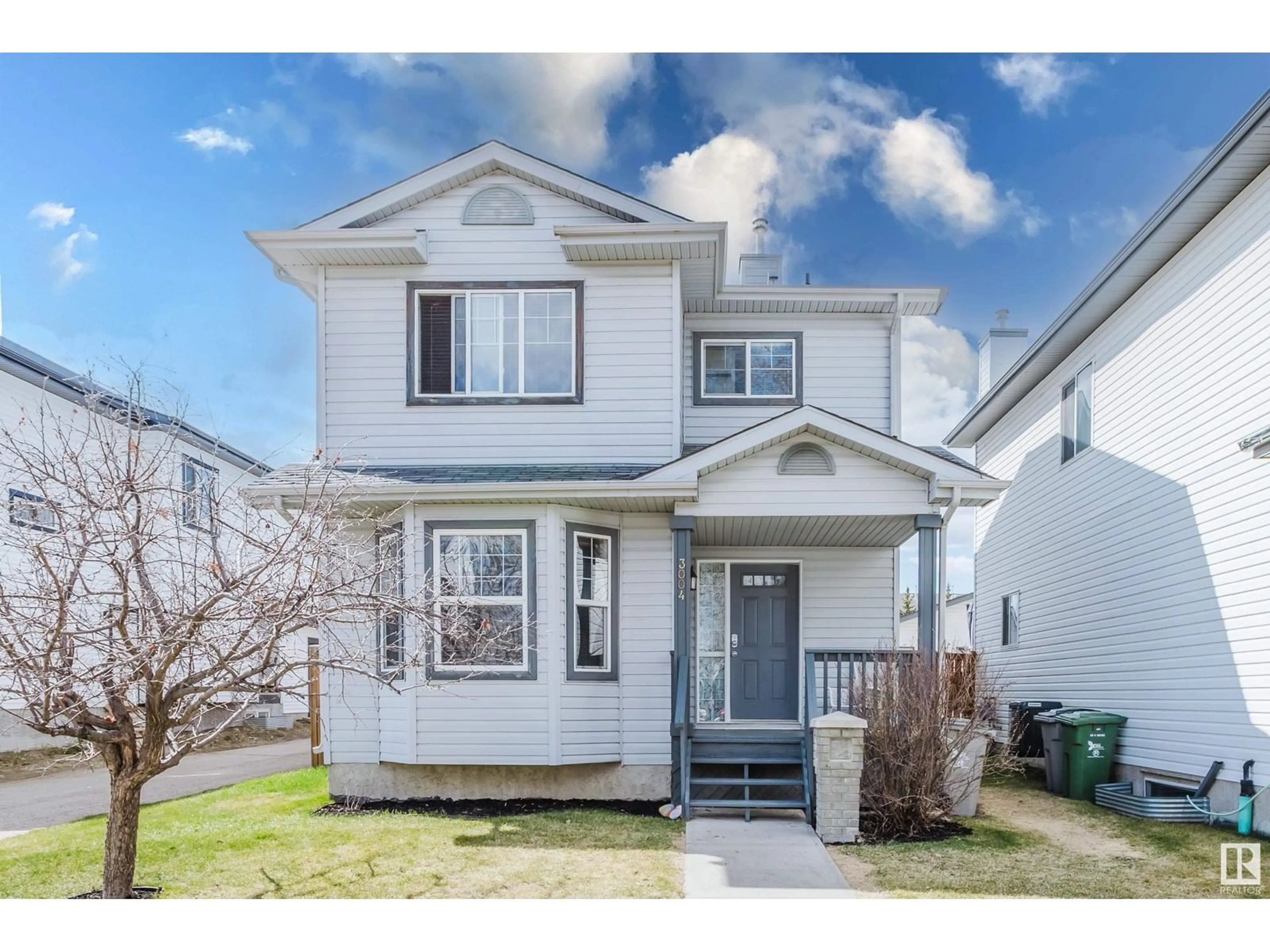 Home with vinyl exterior material, street for 3004 49 ST, Beaumont Alberta T4X1S6