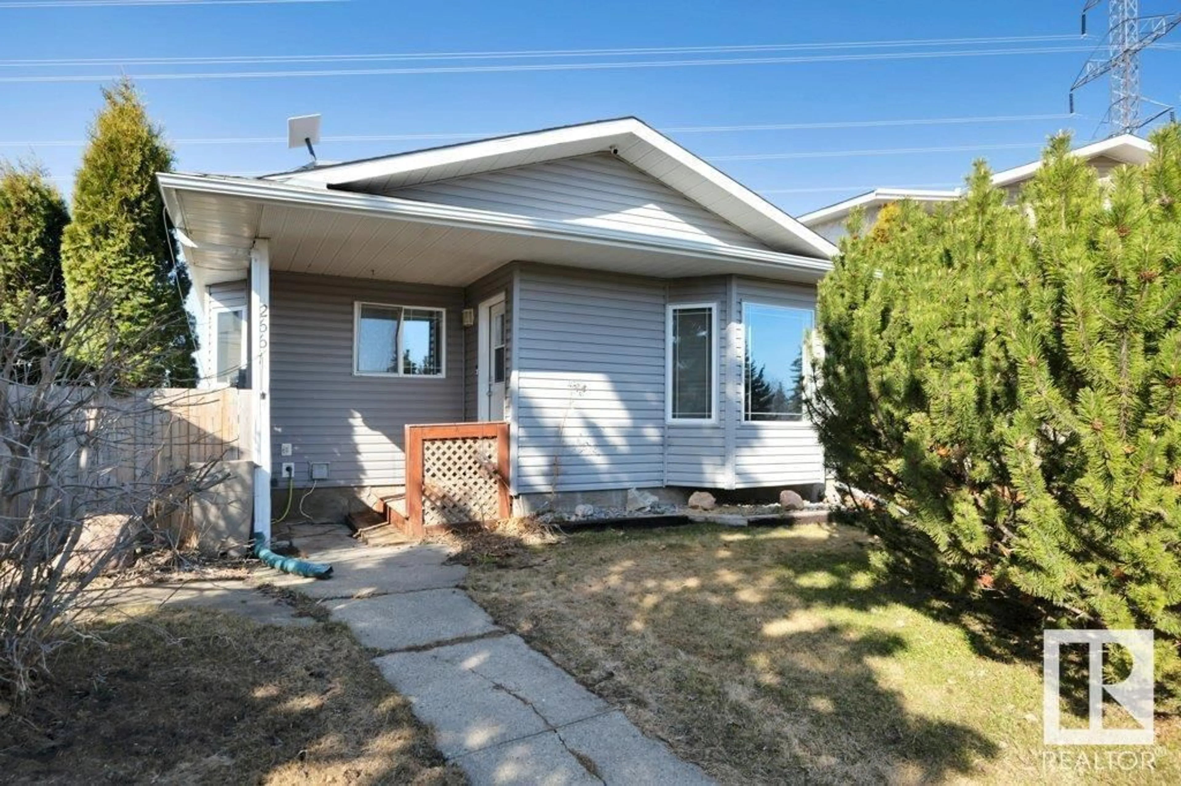 Home with vinyl exterior material, street for 266 PORTER AV, Millet Alberta T0C1Z0