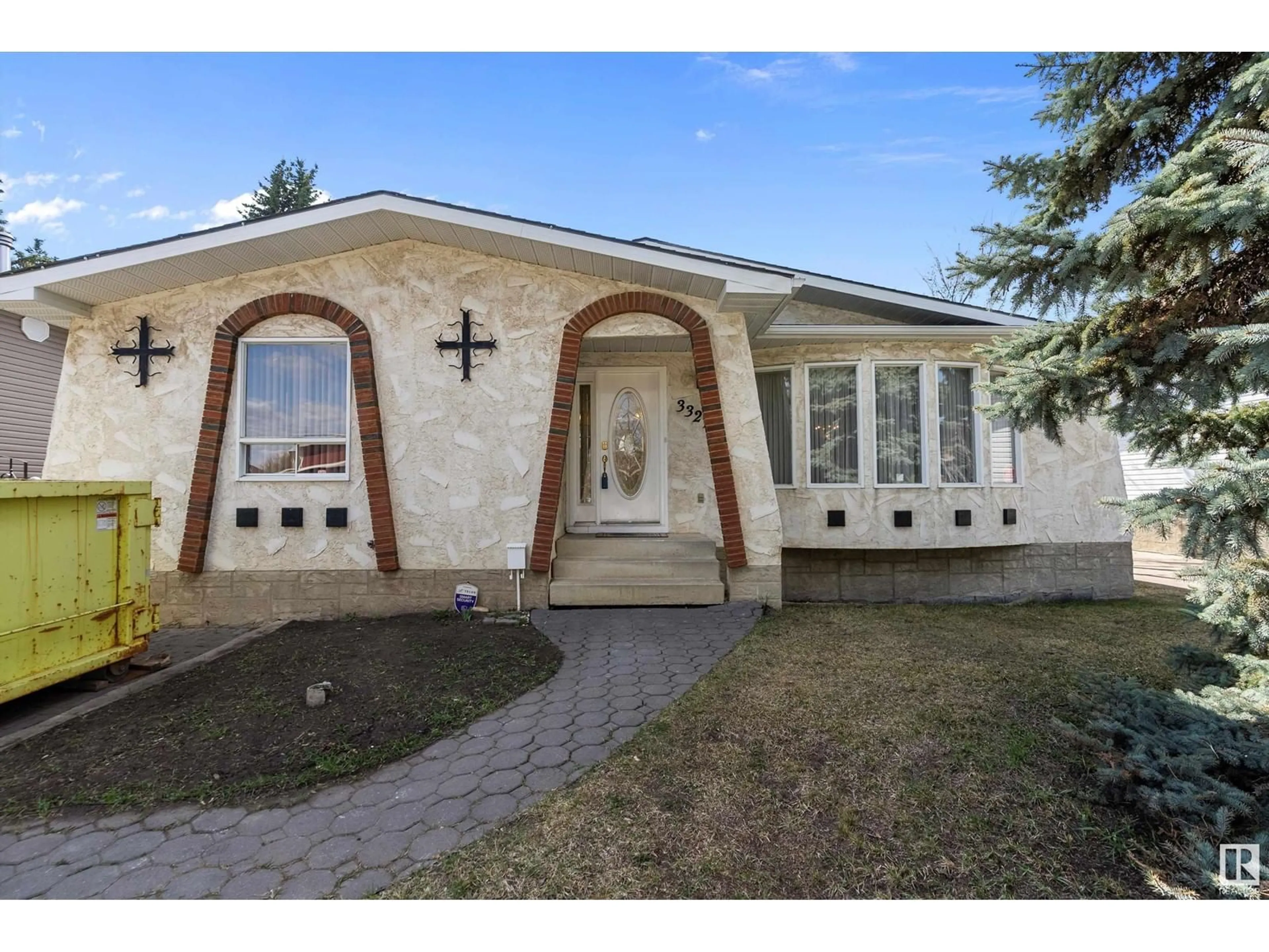 Home with brick exterior material, street for 3327 130 AV, Edmonton Alberta T5A3B4