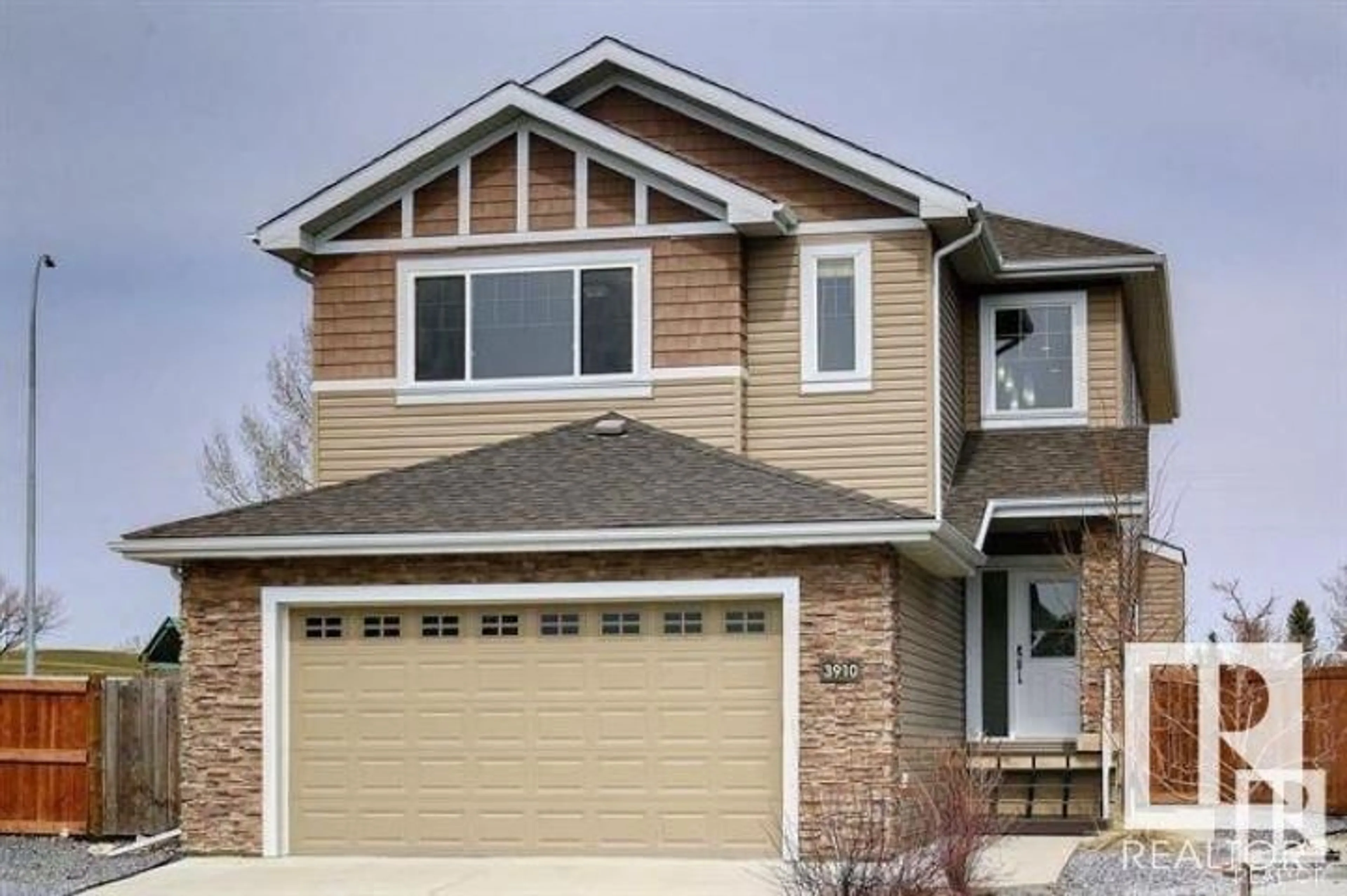Home with vinyl exterior material, street for 3910 49 AV, Beaumont Alberta T4X1Y8