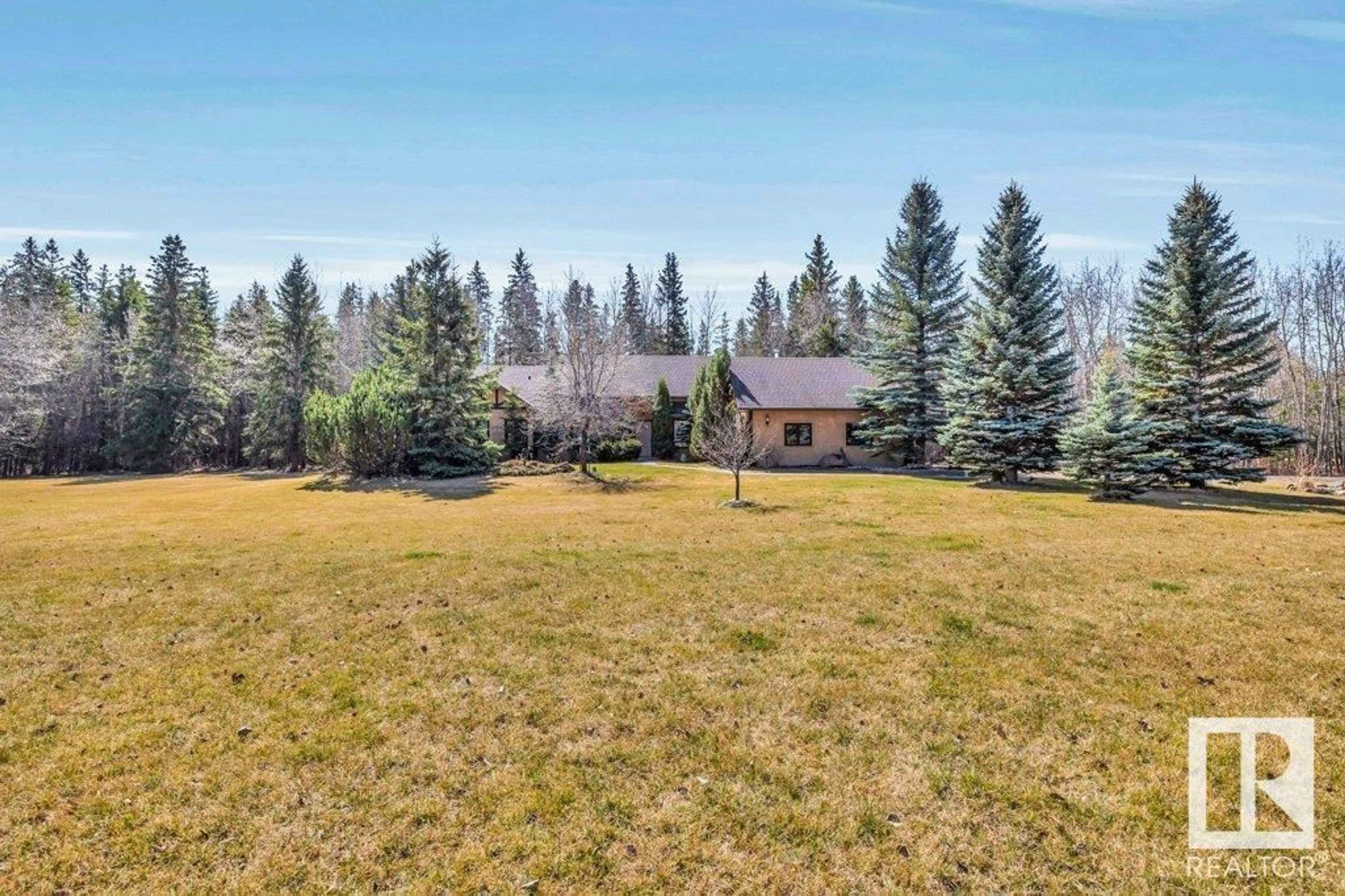A pic from outside/outdoor area/front of a property/back of a property/a pic from drone, unknown for 7 - 26123 TWP RD 511, Rural Parkland County Alberta T7Y1B9