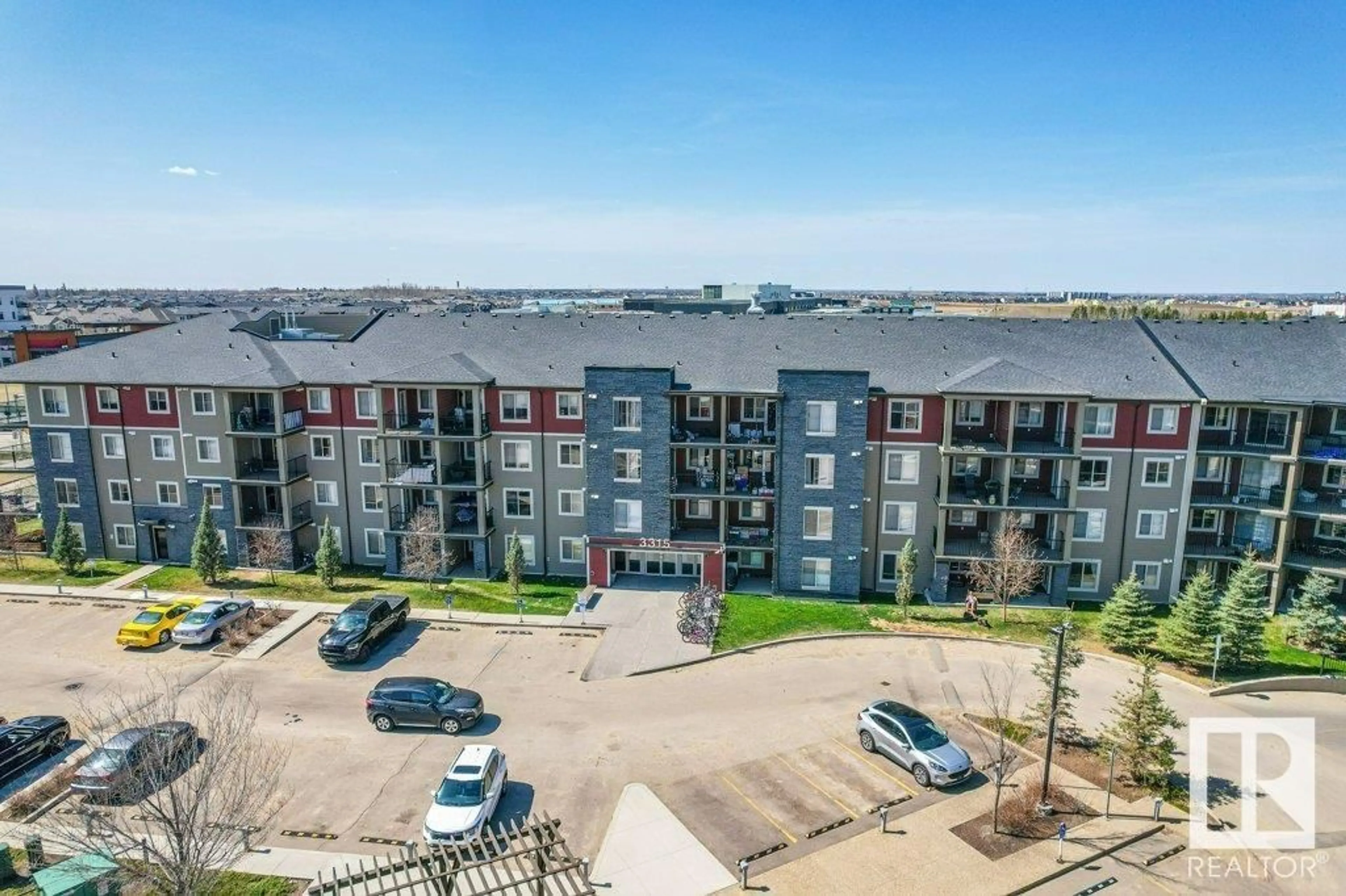 A pic from outside/outdoor area/front of a property/back of a property/a pic from drone, unknown for 207 - 3315 JAMES MOWATT TR, Edmonton Alberta T6W3L9