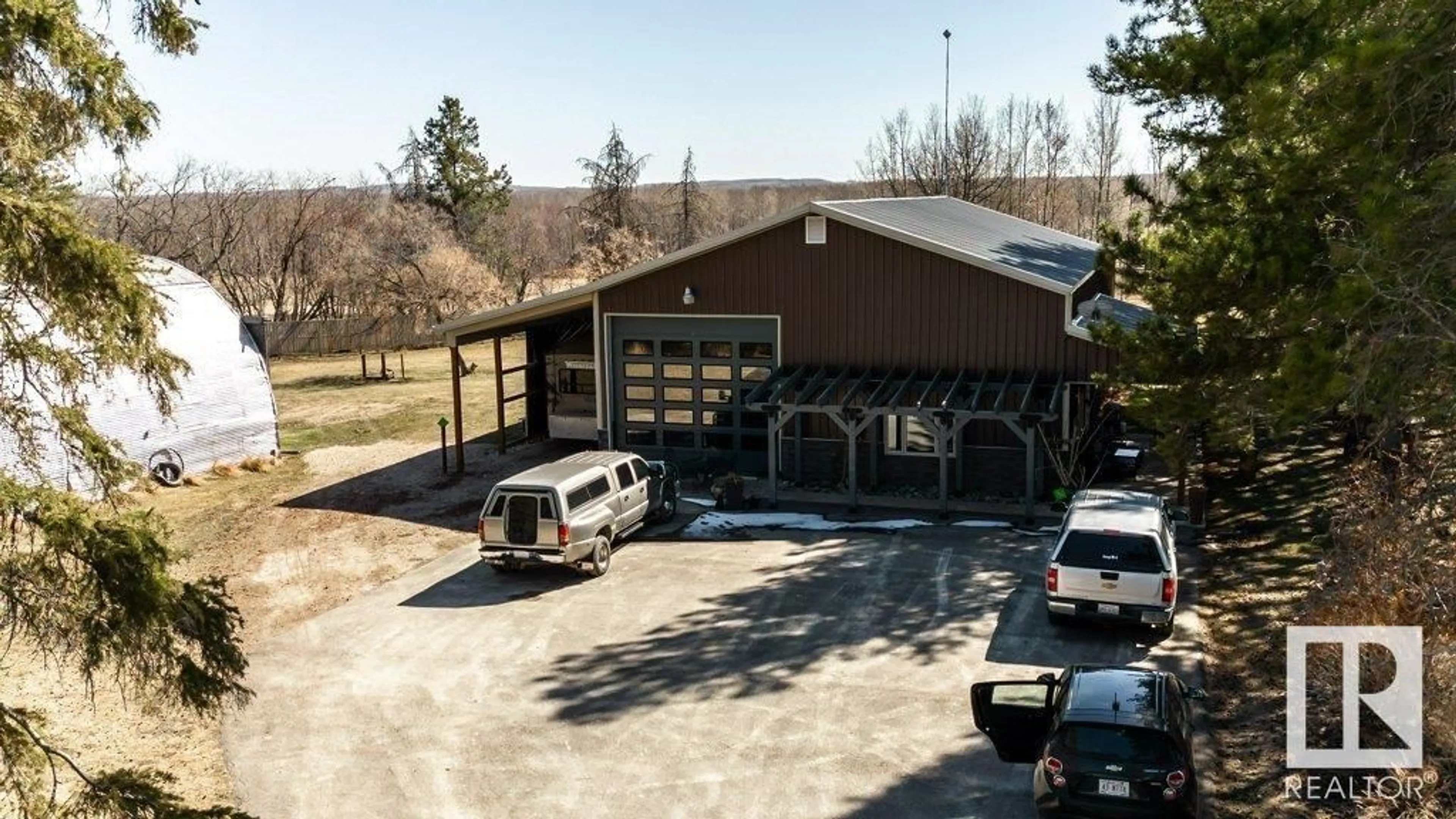 A pic from outside/outdoor area/front of a property/back of a property/a pic from drone, building for 48003 RGE RD 60, Rural Brazeau County Alberta T0C0P0
