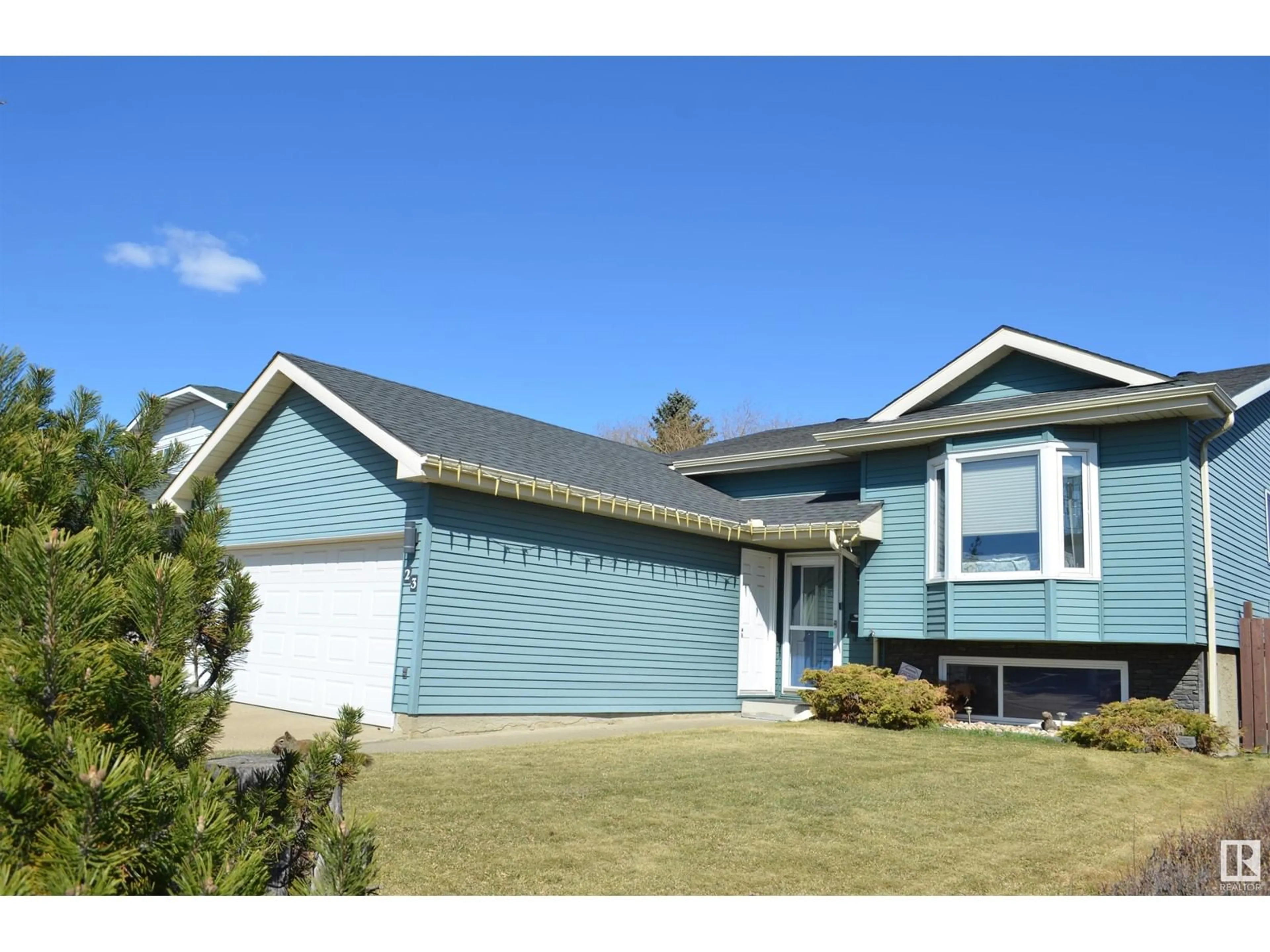 Home with vinyl exterior material, street for 23 HOWSON CR, Edmonton Alberta T5A4T7