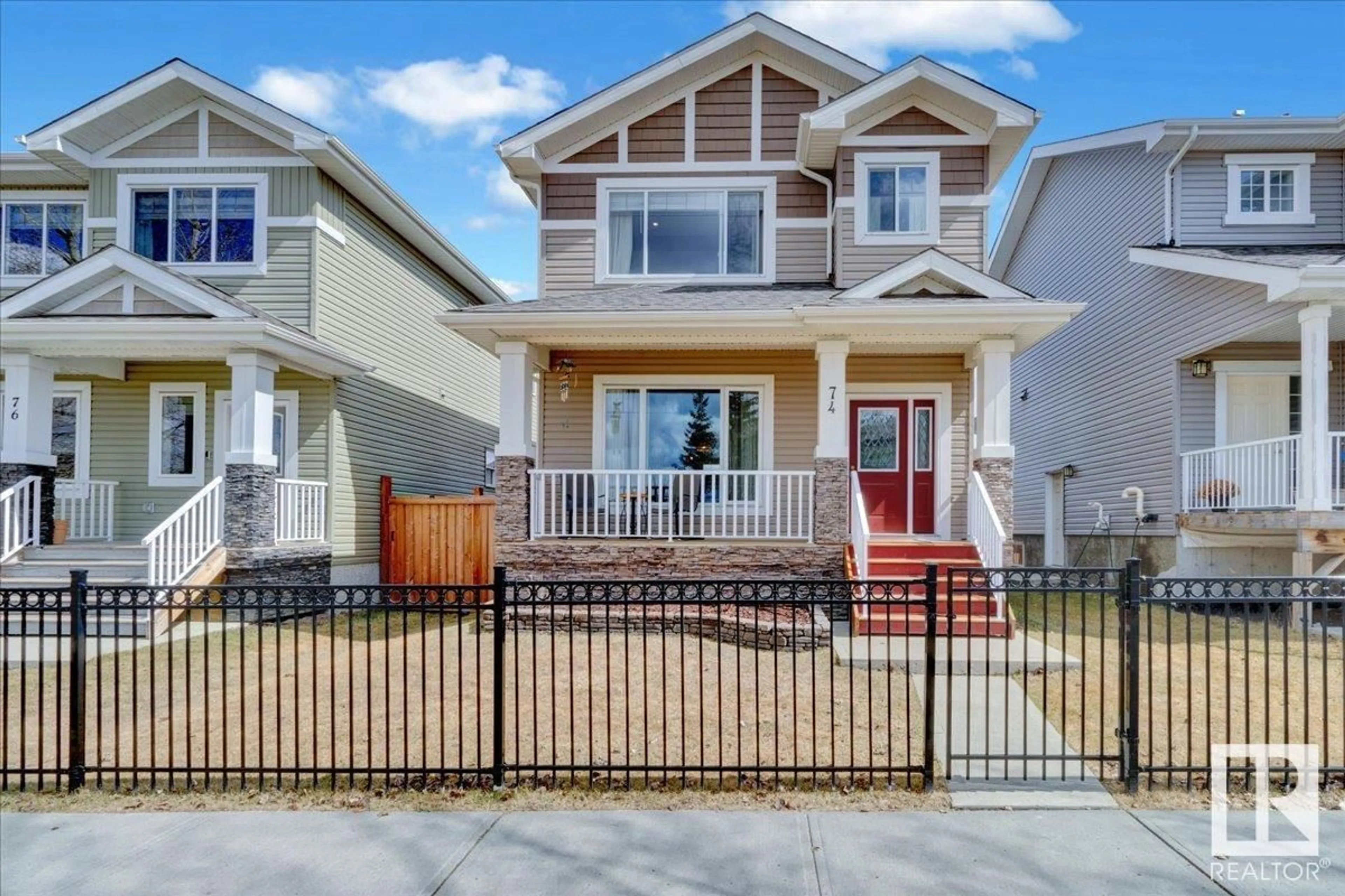 Home with vinyl exterior material, street for 74 STRAWBERRY LN, Leduc Alberta T9E8R6
