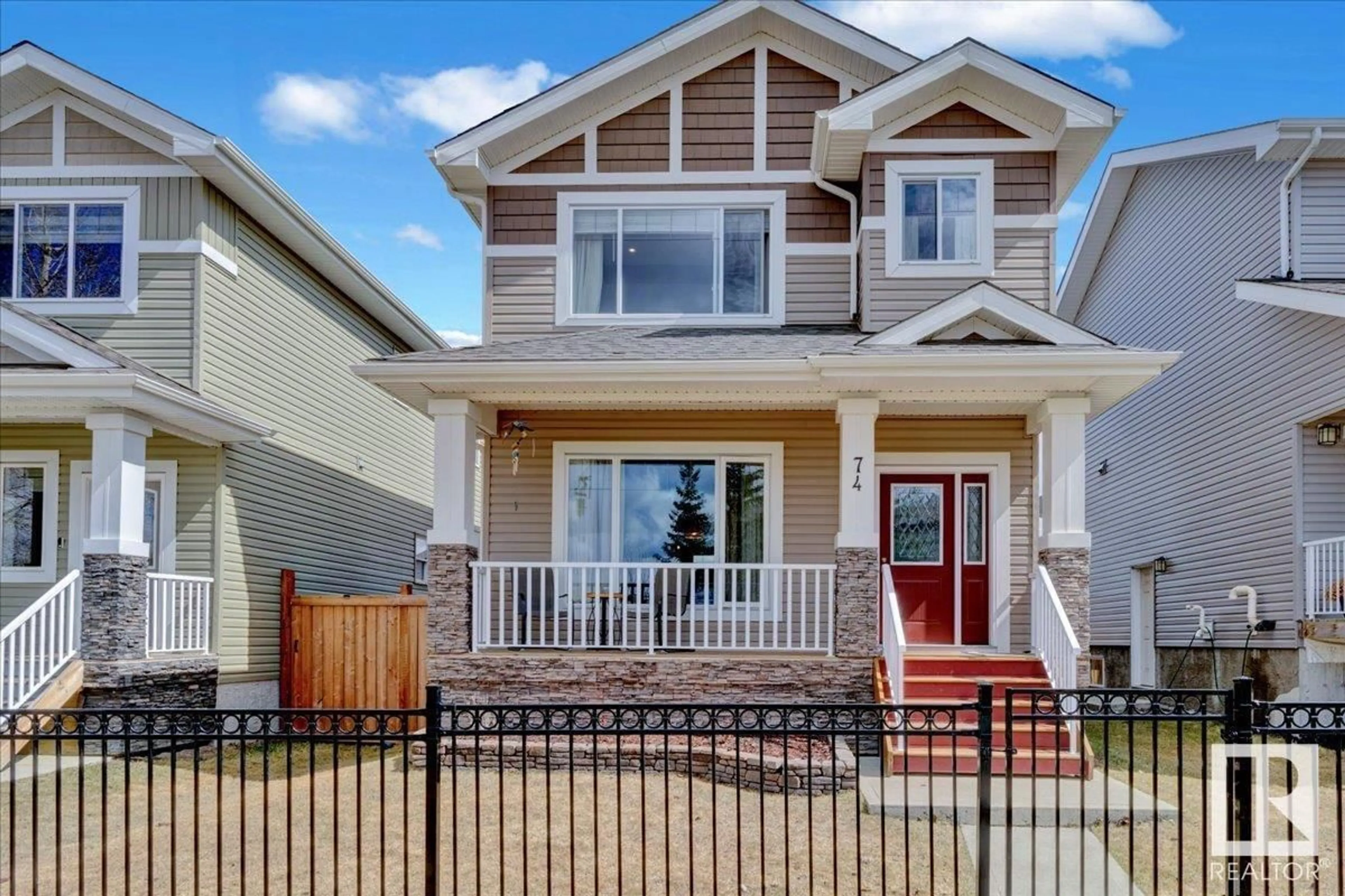Home with vinyl exterior material, street for 74 STRAWBERRY LN, Leduc Alberta T9E8R6