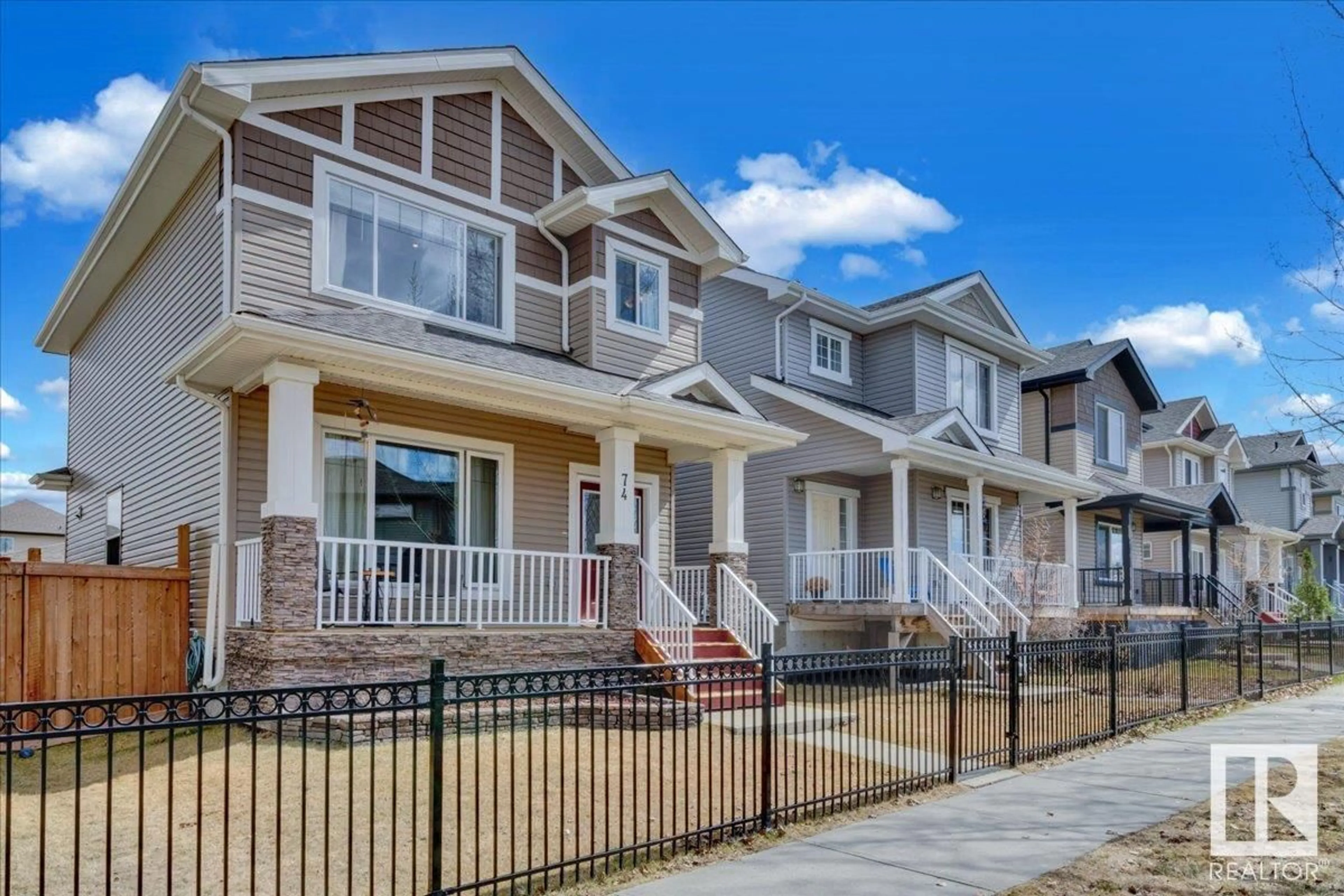 Home with vinyl exterior material, street for 74 STRAWBERRY LN, Leduc Alberta T9E8R6