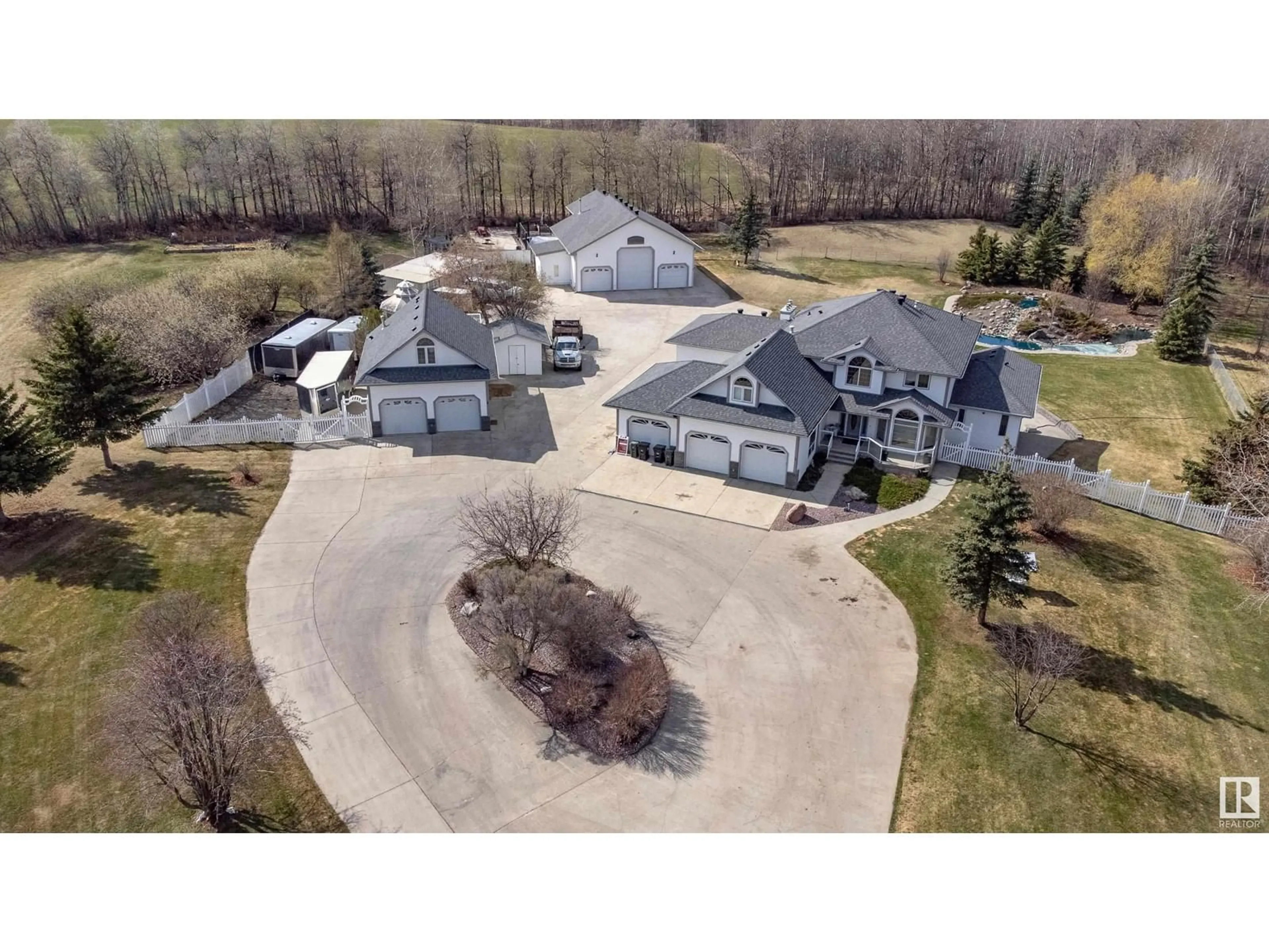 A pic from outside/outdoor area/front of a property/back of a property/a pic from drone, street for 52458 - 397 RGE ROAD 223, Rural Strathcona County Alberta T8A5V1