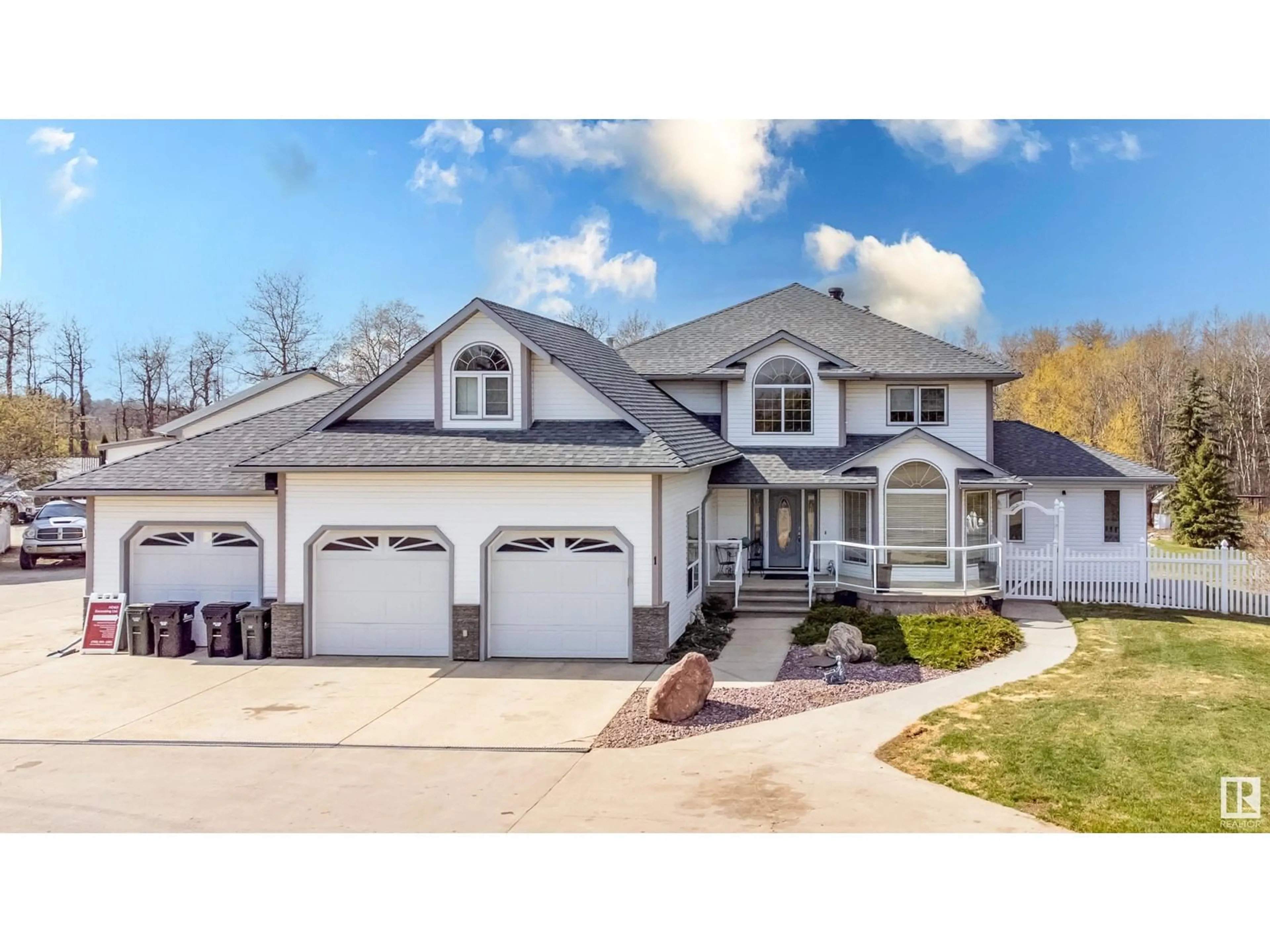 Home with vinyl exterior material, street for 52458 - 397 RGE ROAD 223, Rural Strathcona County Alberta T8A5V1