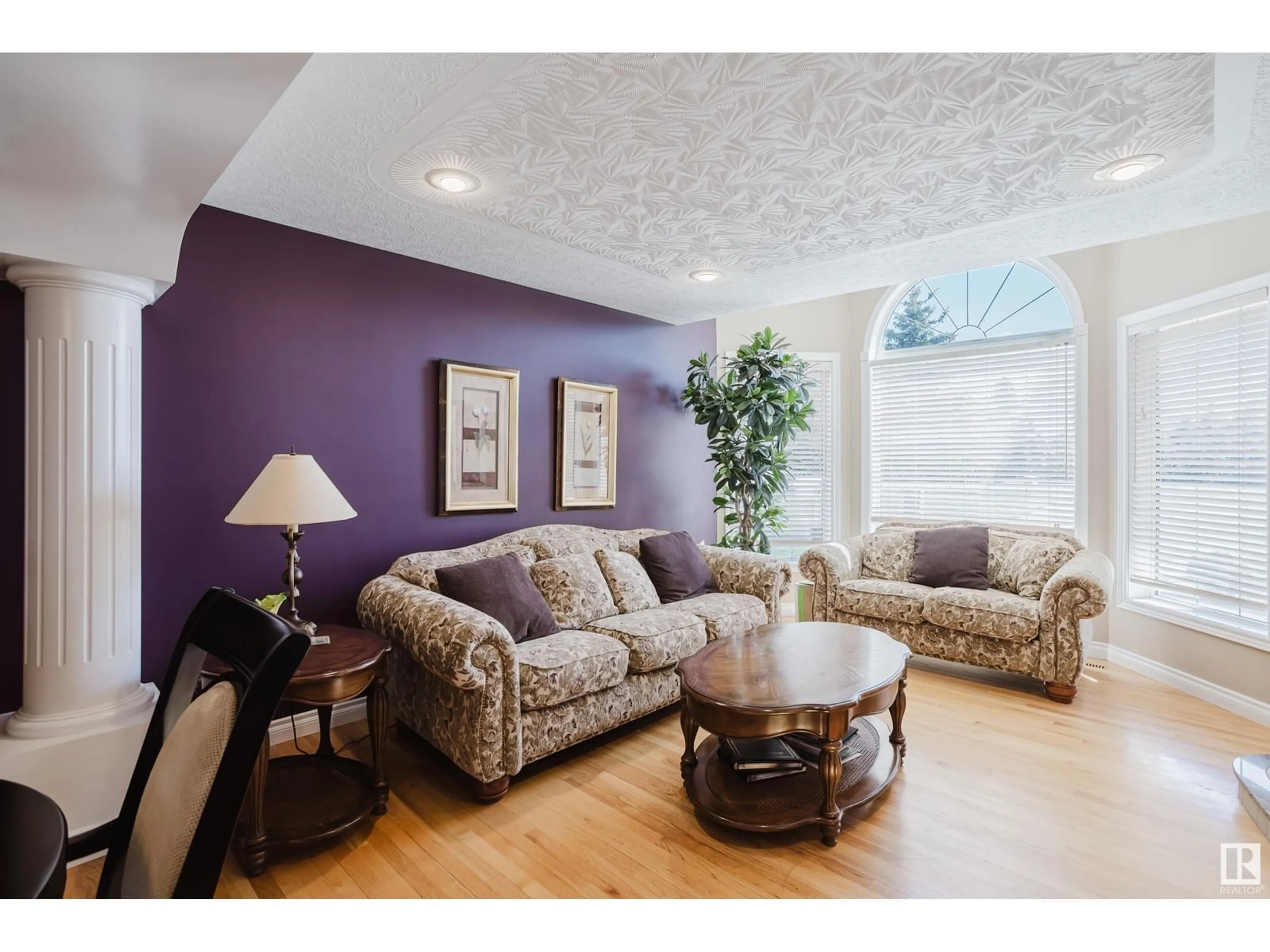 Living room with furniture, wood/laminate floor for 52458 - 397 RGE ROAD 223, Rural Strathcona County Alberta T8A5V1