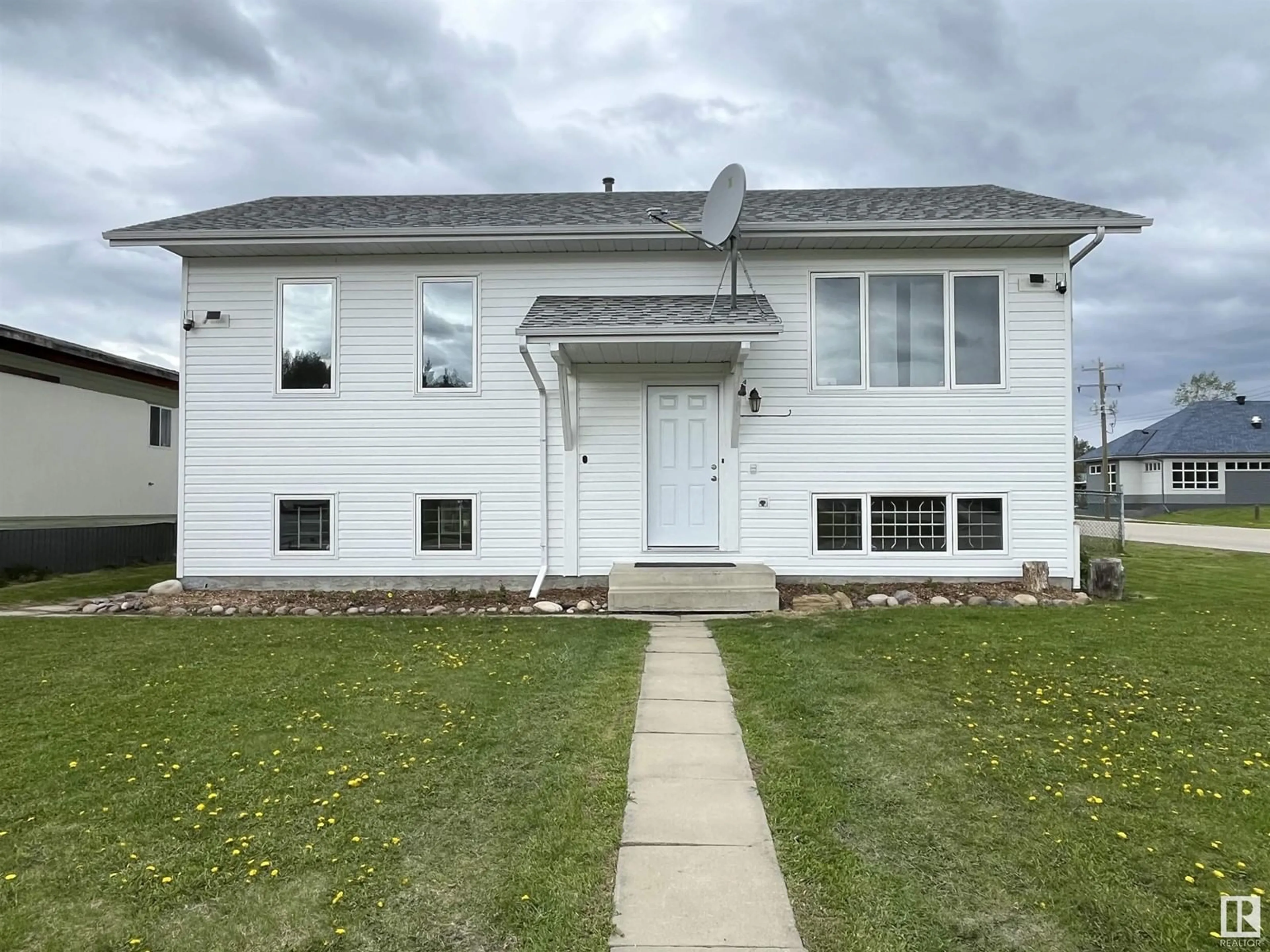 Home with vinyl exterior material, street for 130 1 ST, Blue Ridge Alberta T0E0B0