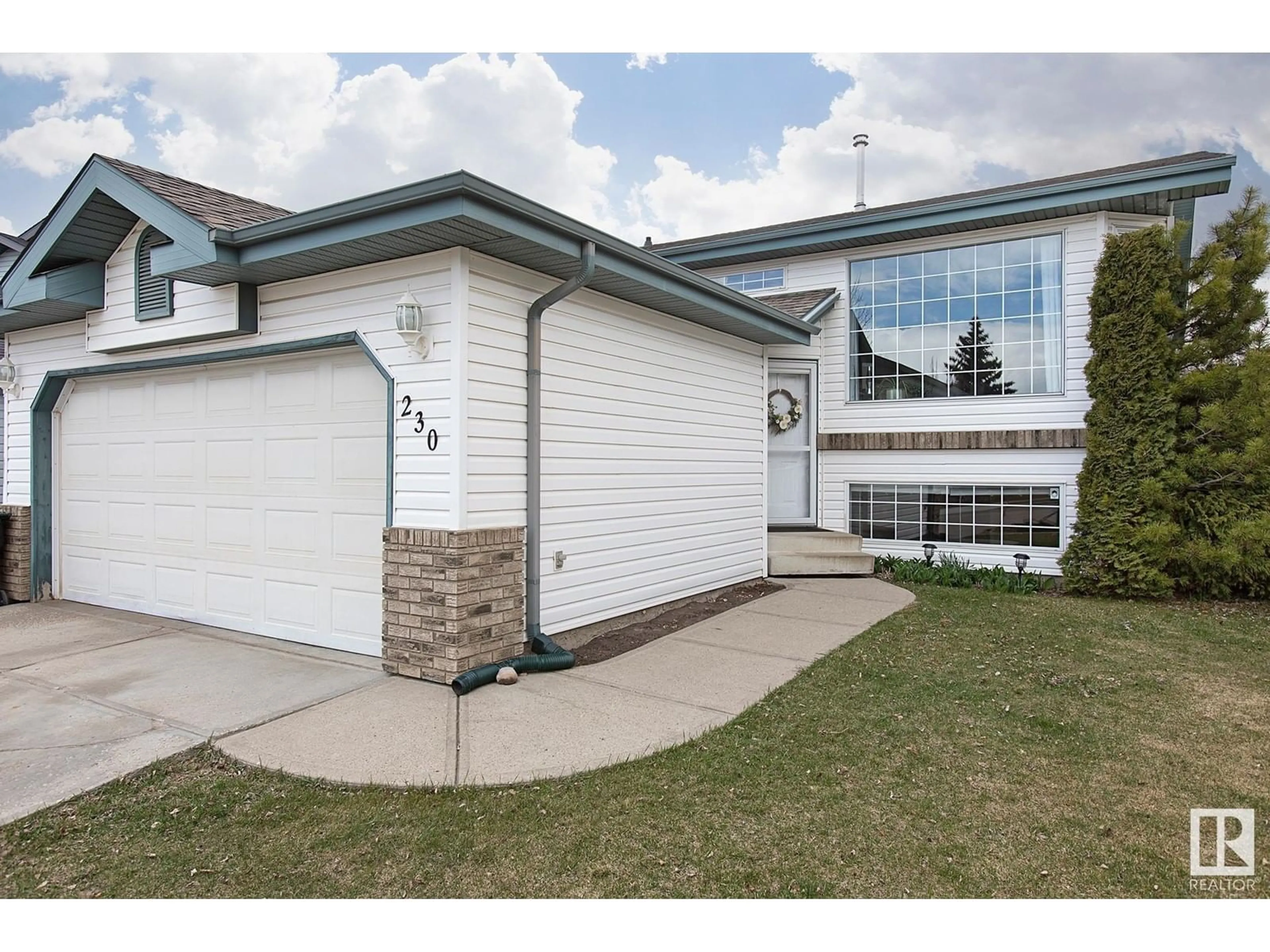 Home with vinyl exterior material, street for 230 RAINBOW CR, Sherwood Park Alberta T8A5Y1