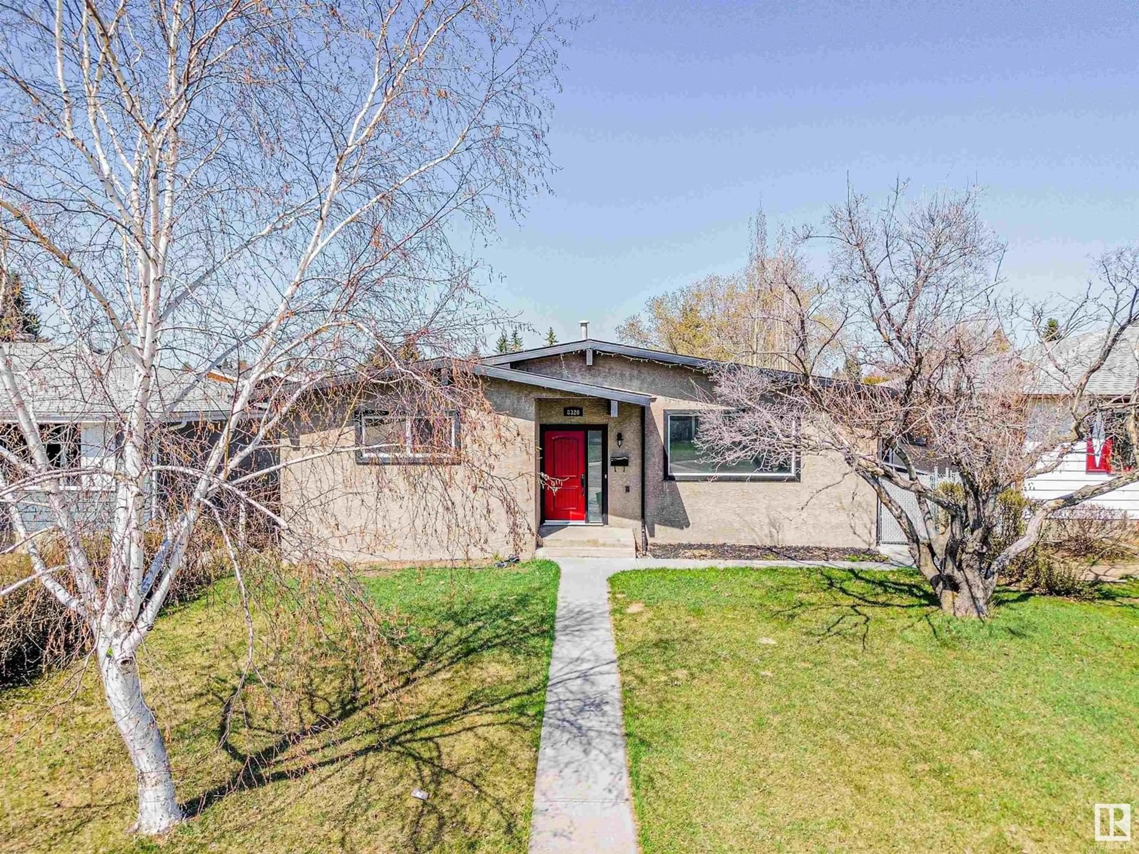 A pic from outside/outdoor area/front of a property/back of a property/a pic from drone, street for 8320 138 AV, Edmonton Alberta T5E2A5