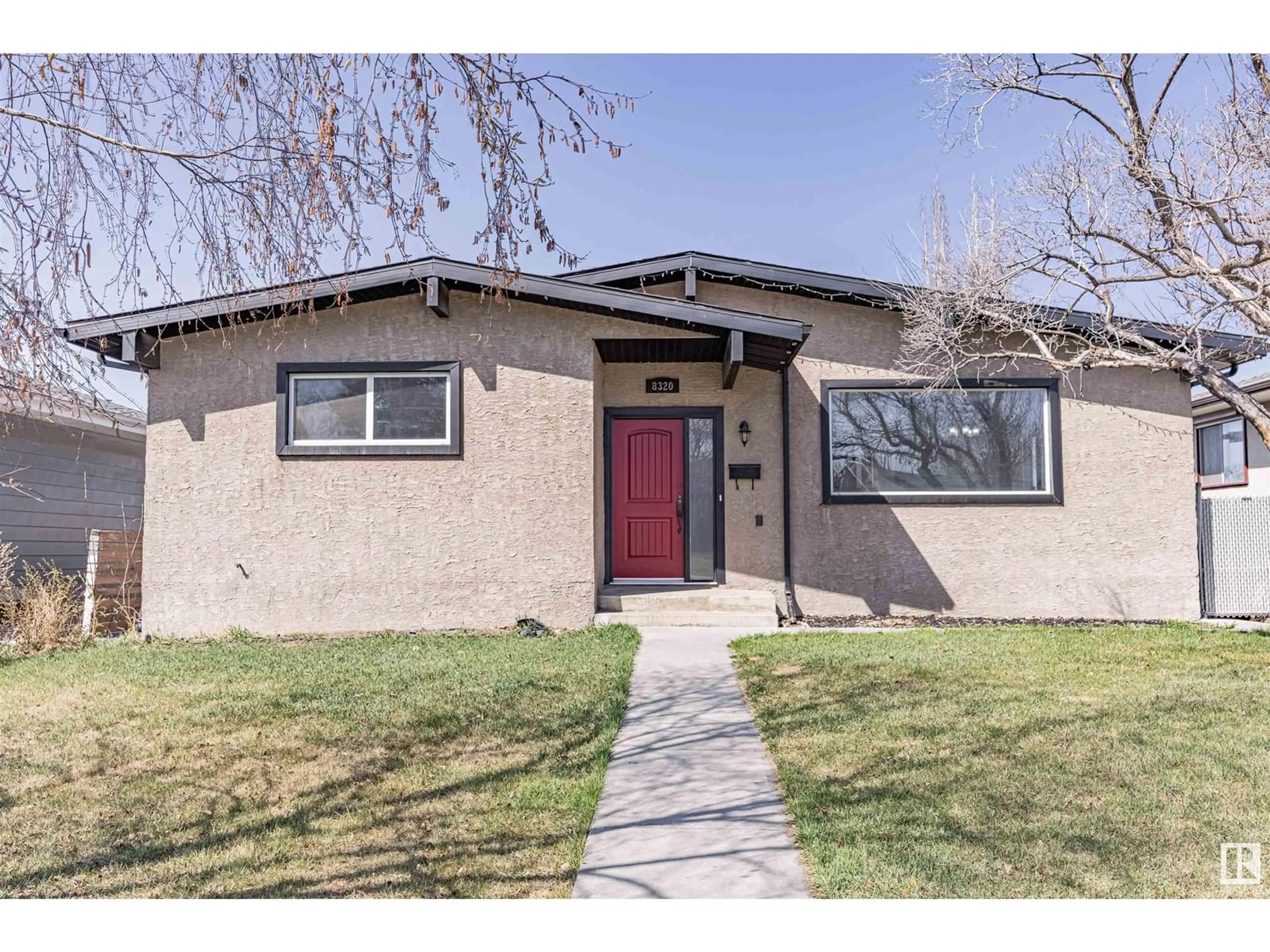 Home with vinyl exterior material, street for 8320 138 AV, Edmonton Alberta T5E2A5