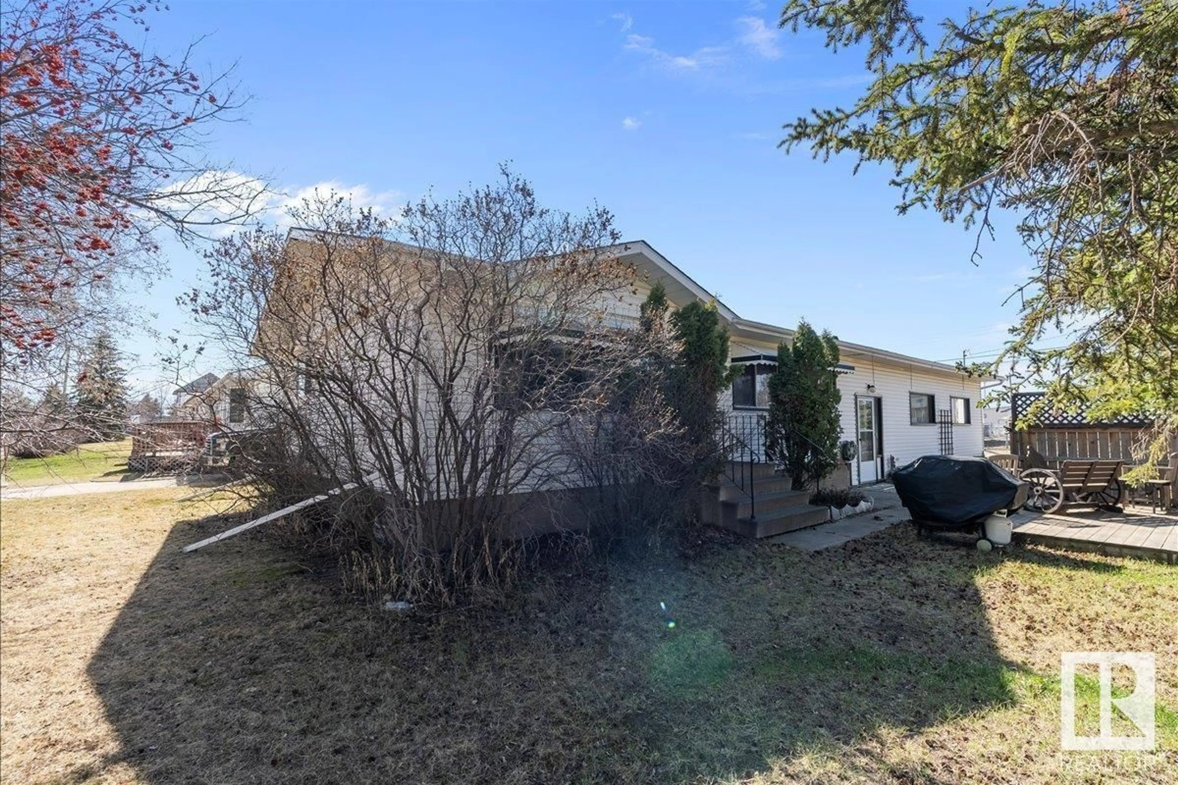 A pic from outside/outdoor area/front of a property/back of a property/a pic from drone, street for 5315 51 ST, Tofield Alberta T0B4J0