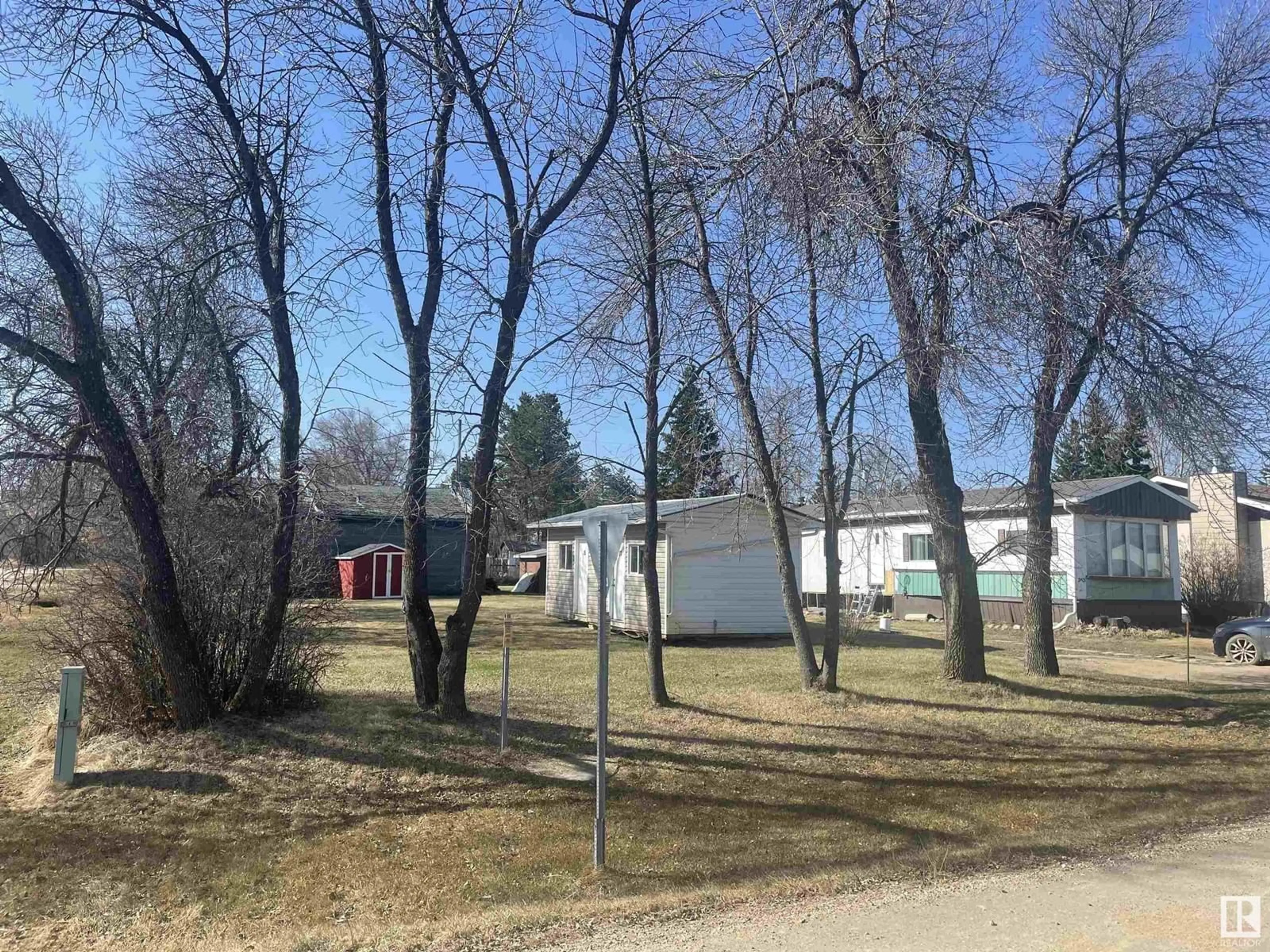 A pic from outside/outdoor area/front of a property/back of a property/a pic from drone, street for 5003 49 AVE, Grassland Alberta T0V1V0