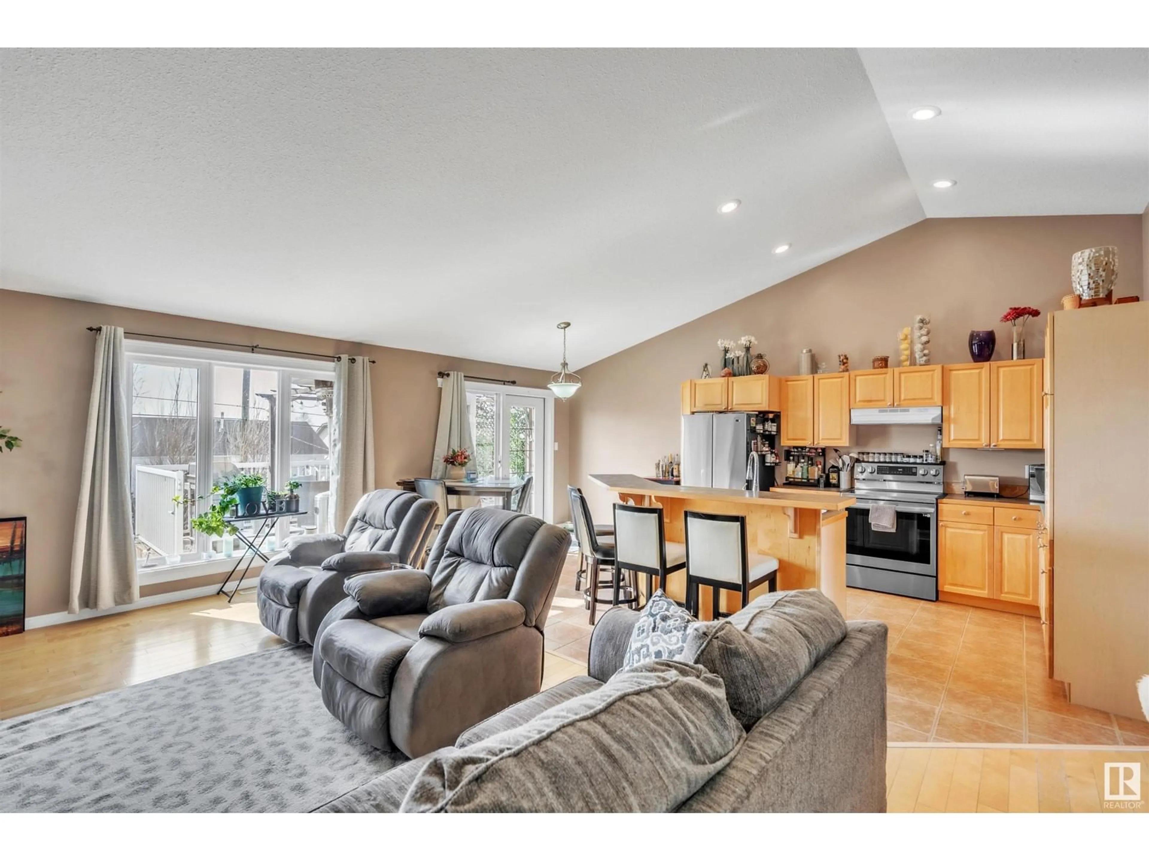 Open concept kitchen, wood/laminate floor for 1717 6 ST, Cold Lake Alberta T9N1L5