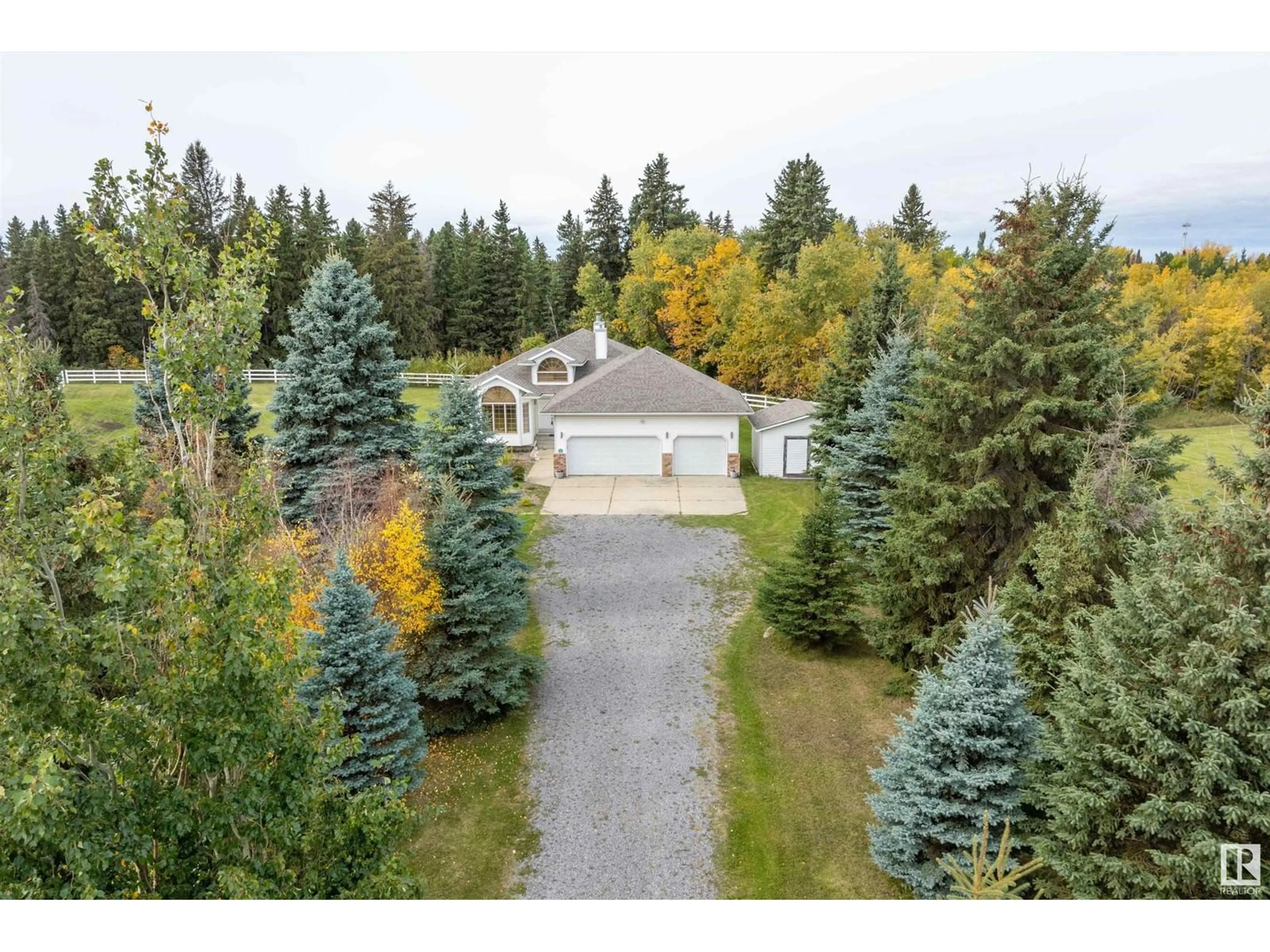 A pic from outside/outdoor area/front of a property/back of a property/a pic from drone, forest/trees view for 474062 HIGHWAY 2A, Rural Wetaskiwin County Alberta T0C1Z0