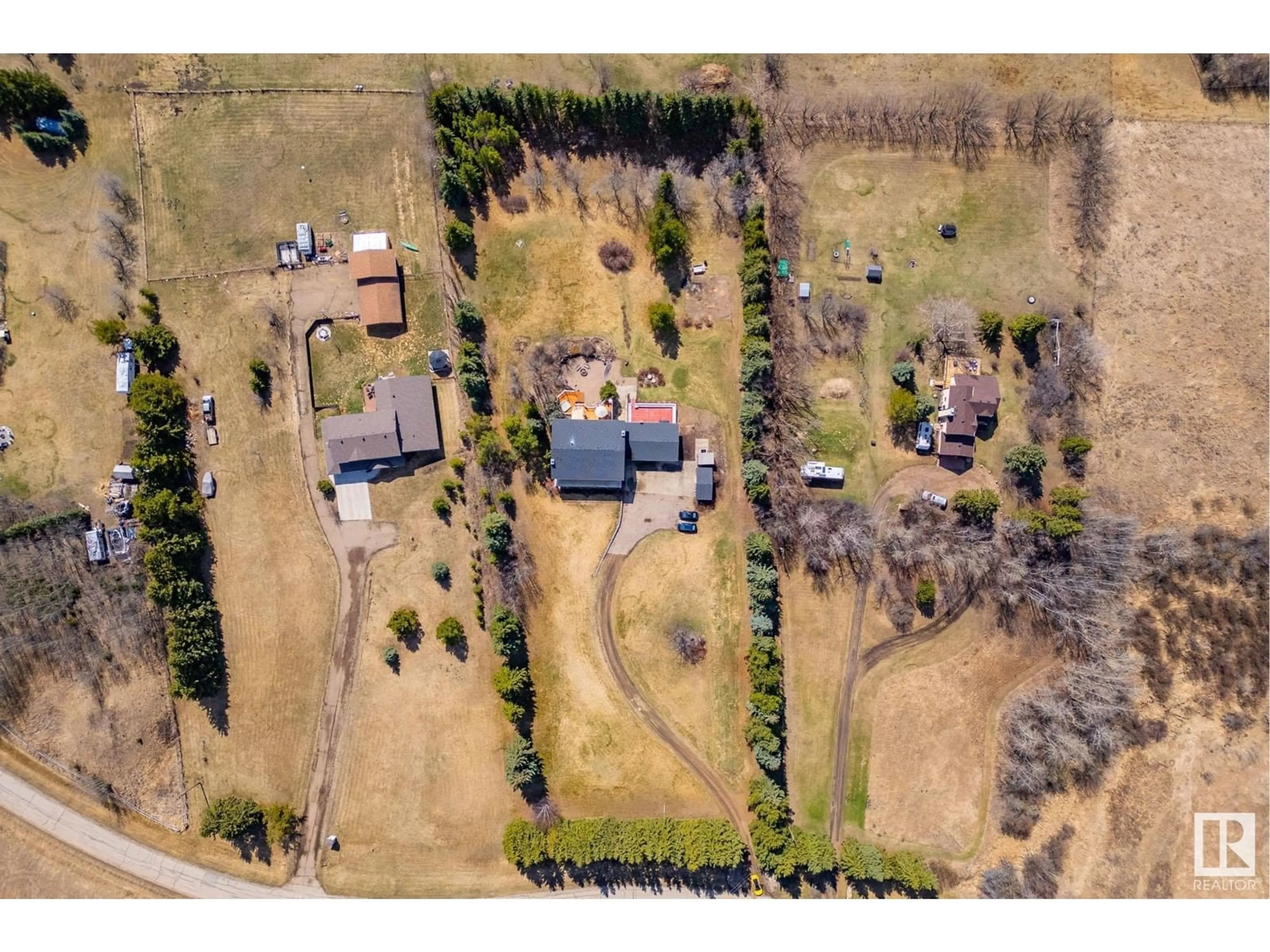 A pic from outside/outdoor area/front of a property/back of a property/a pic from drone, unknown for #218 - 21252 TWP ROAD 540, Rural Strathcona County Alberta T8G2A1