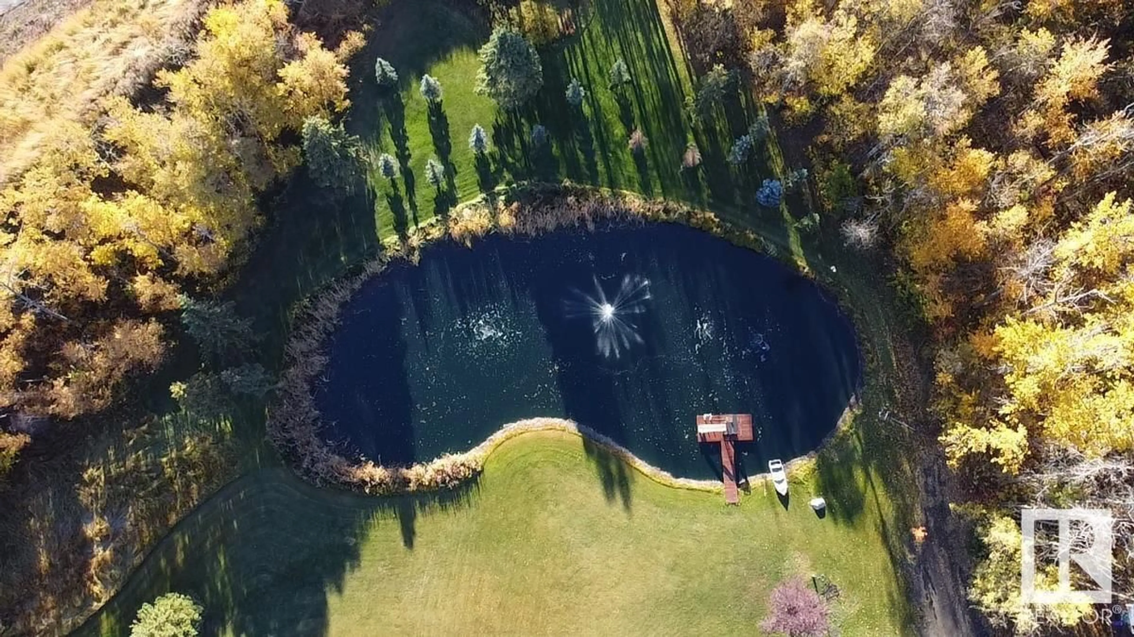 A pic from outside/outdoor area/front of a property/back of a property/a pic from drone, water/lake/river/ocean view for 23027 TOWNSHIP ROAD, Rural Strathcona County Alberta T8B1K9