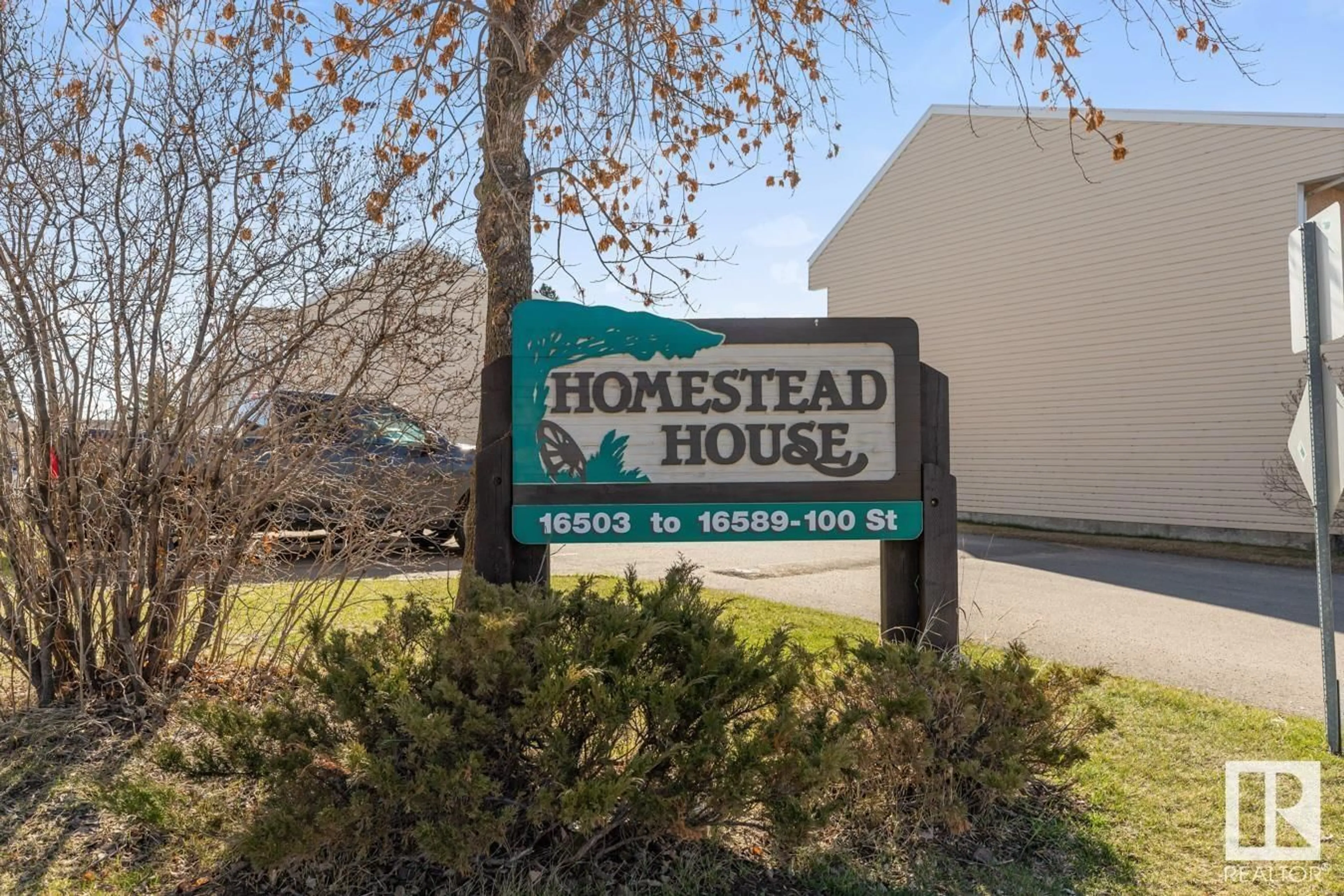 Home with vinyl exterior material, street for NW - 16537 100 ST, Edmonton Alberta T5X5H4