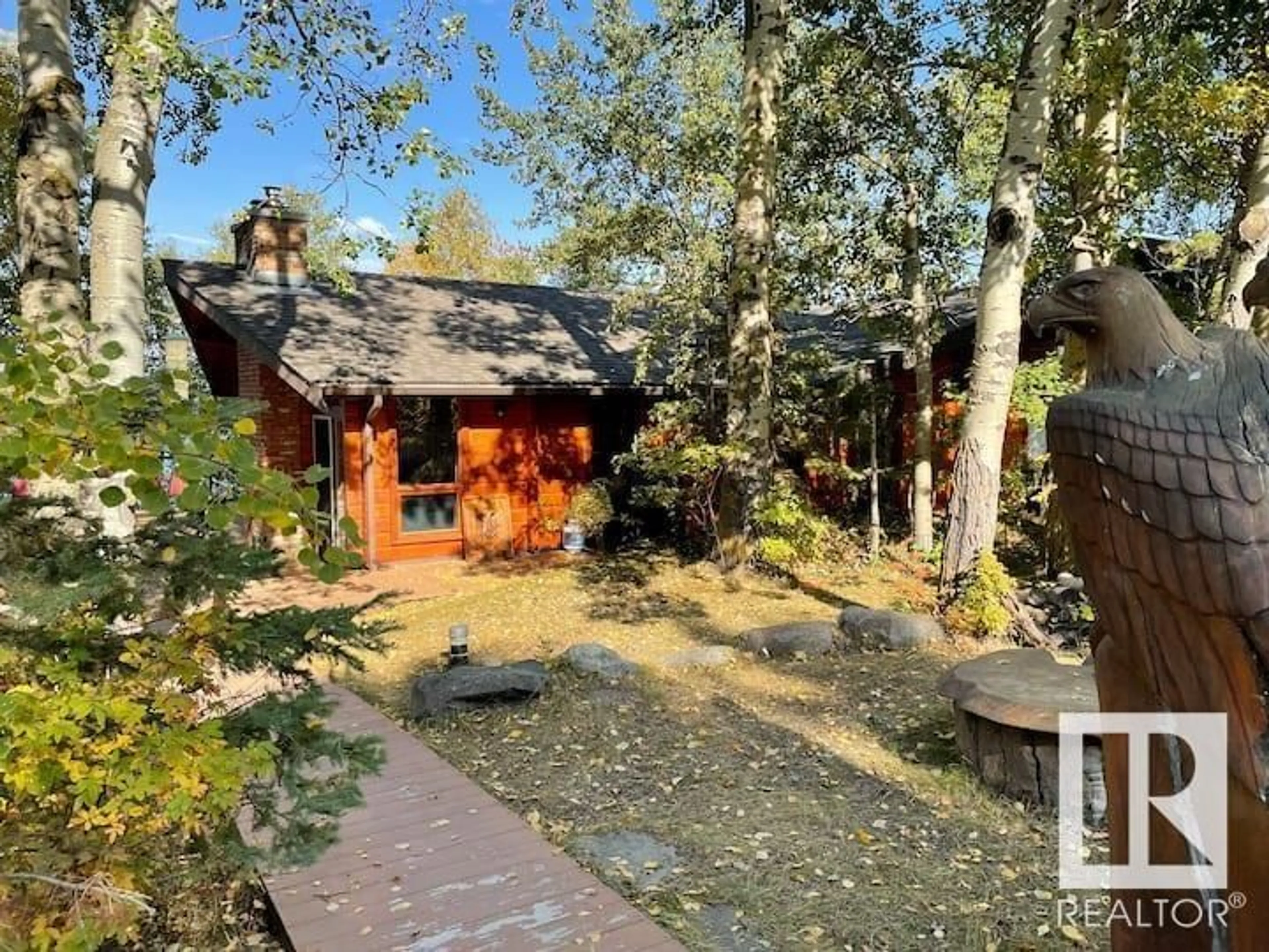 A pic from outside/outdoor area/front of a property/back of a property/a pic from drone, forest/trees view for 217 LAKESHORE DR, Rural Wetaskiwin County Alberta T0C2V0