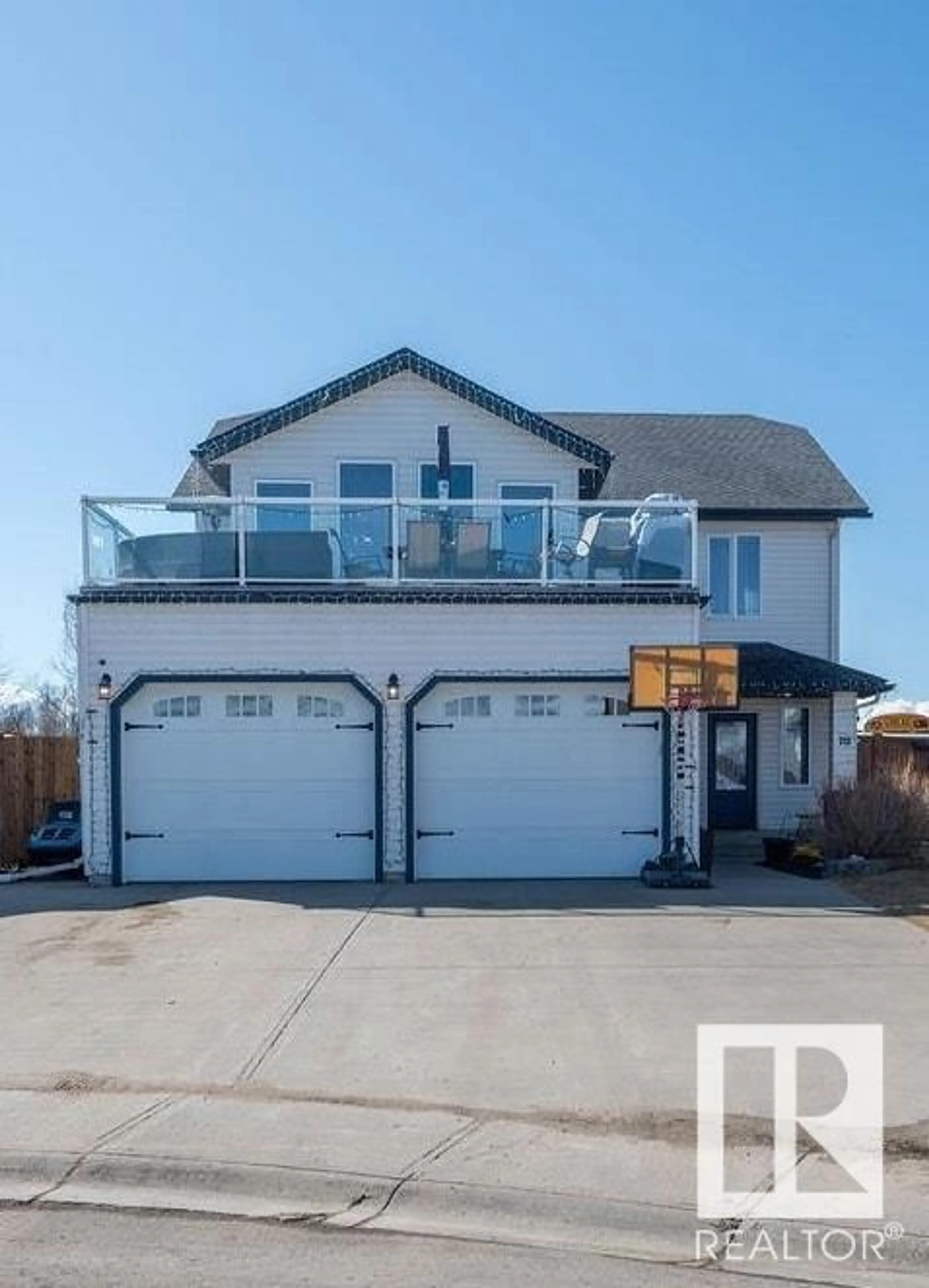 Home with vinyl exterior material, street for 711 GROUSE CL, Cold Lake Alberta T9M0A5