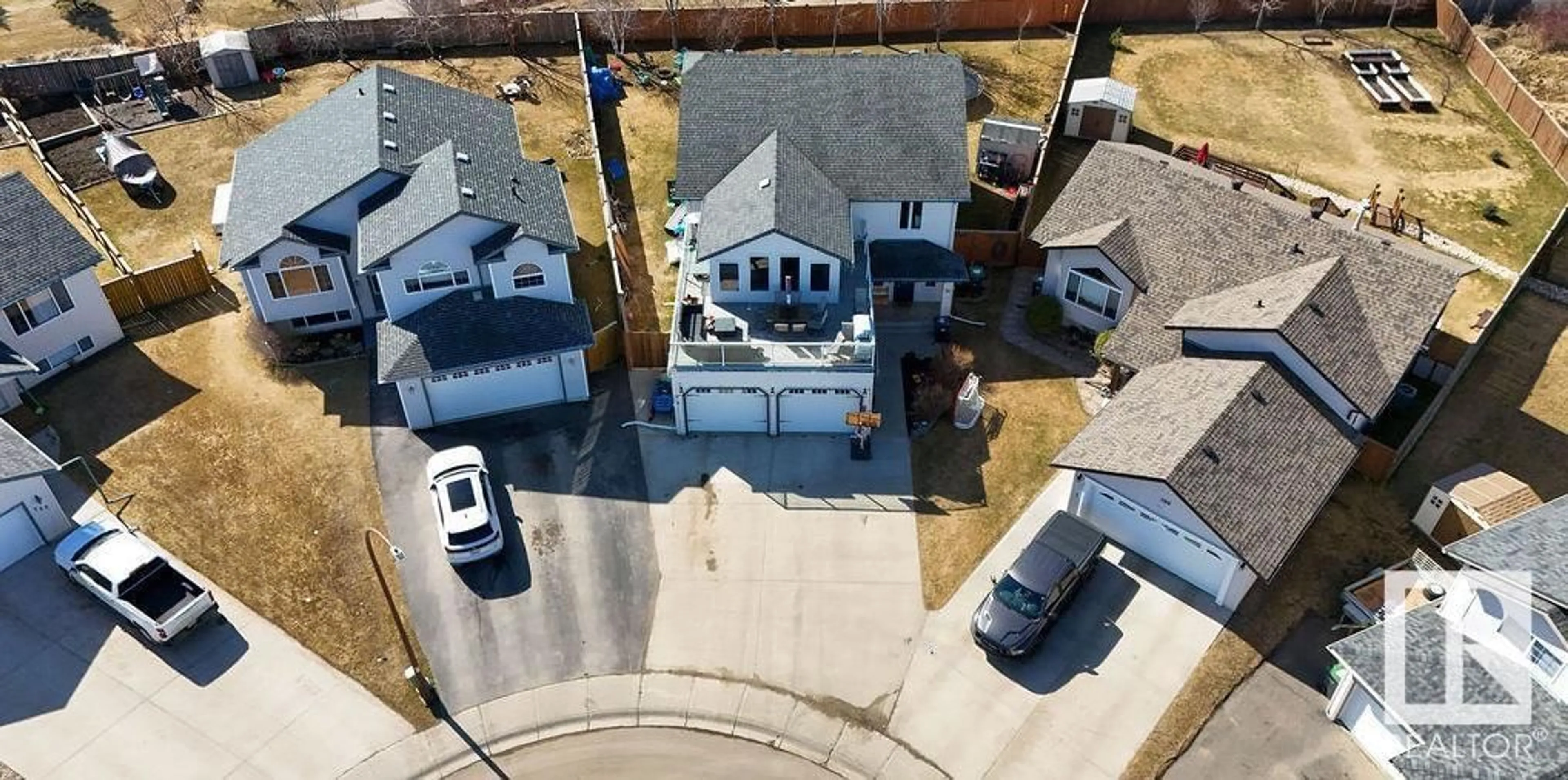 A pic from outside/outdoor area/front of a property/back of a property/a pic from drone, street for 711 GROUSE CL, Cold Lake Alberta T9M0A5