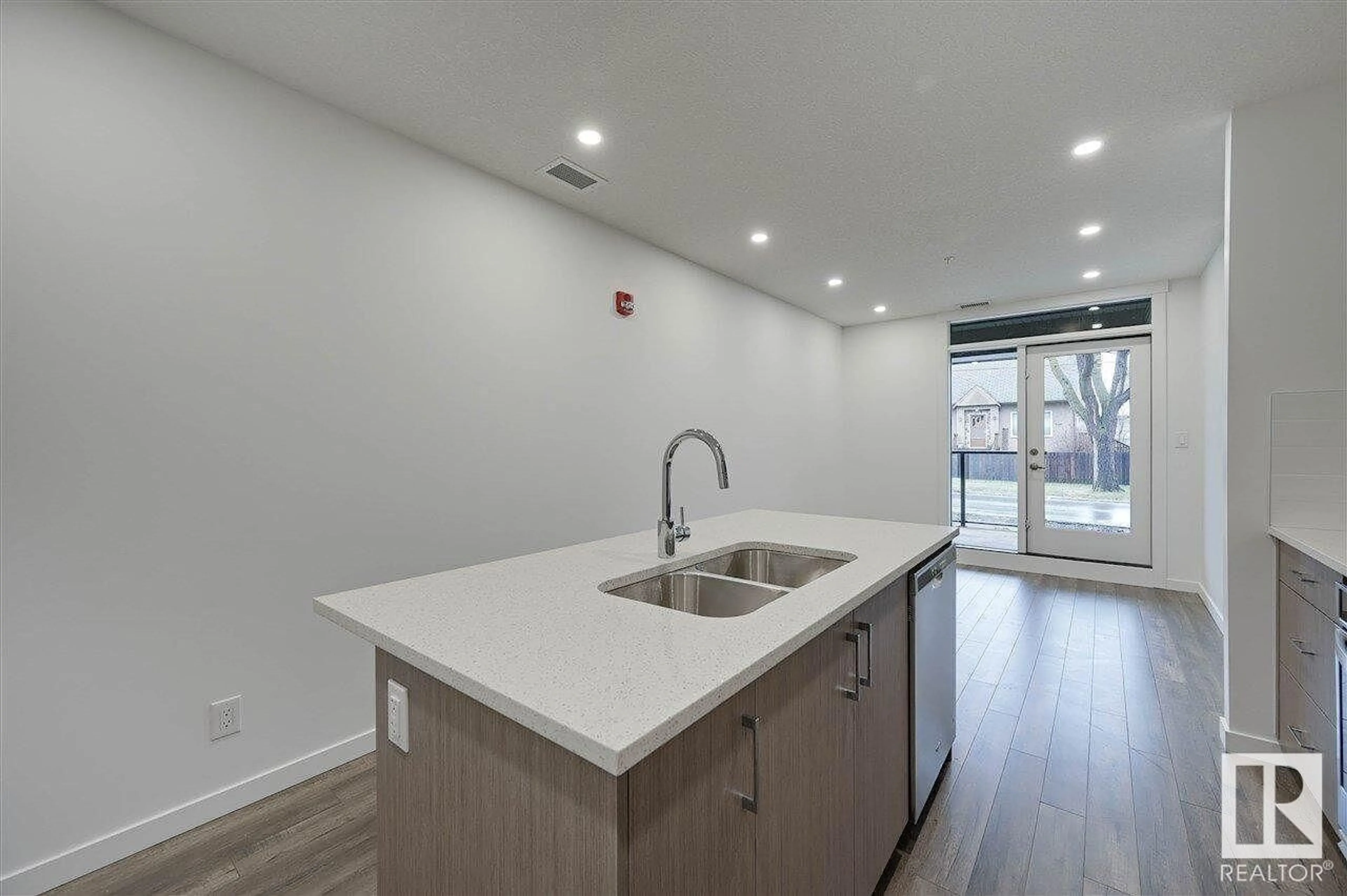 Open concept kitchen, unknown for #104 - 11503 76 AV, Edmonton Alberta T6G0K6