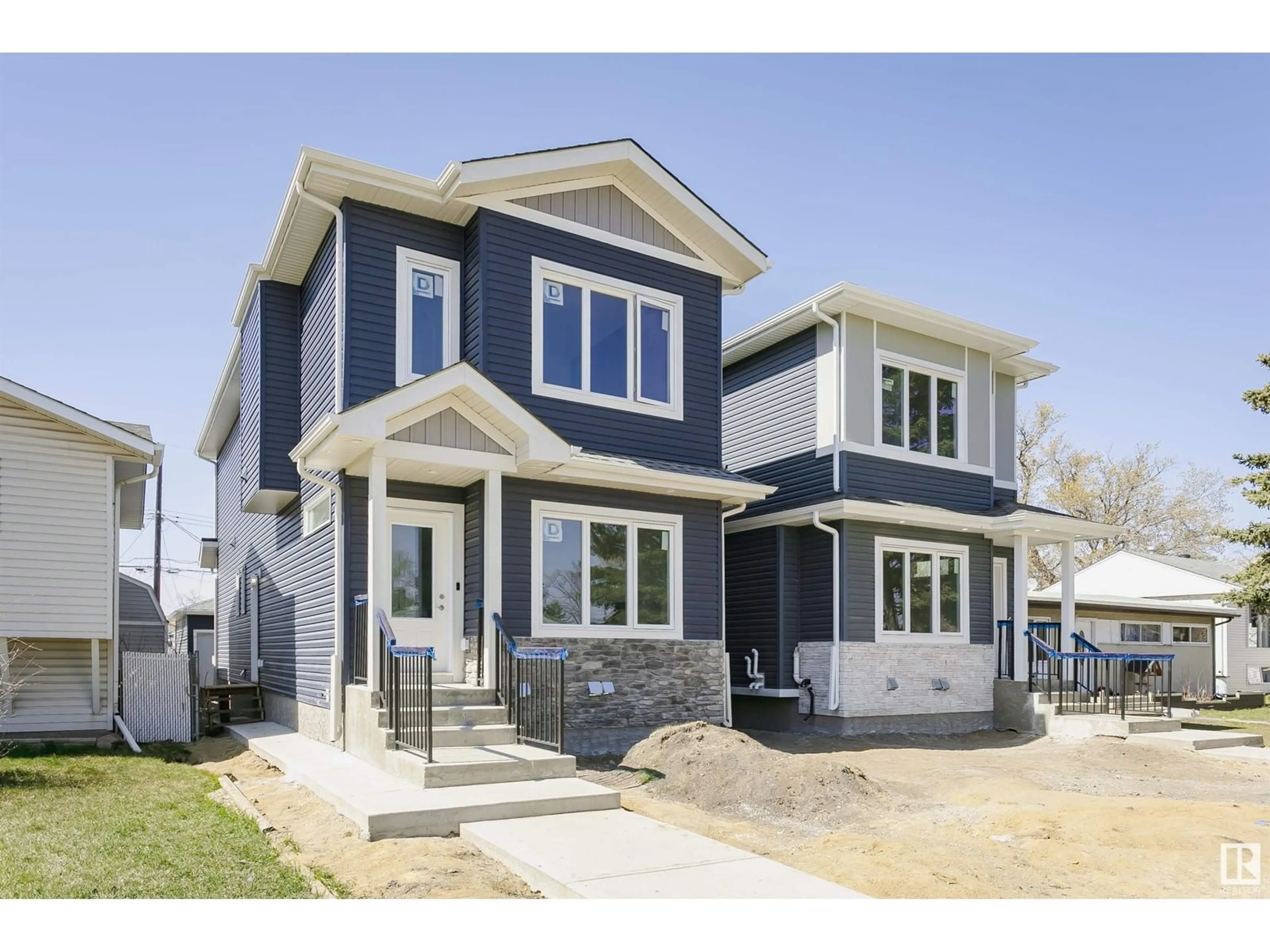 Home with vinyl exterior material, street for NW - 10936 157 ST, Edmonton Alberta T5P4T2