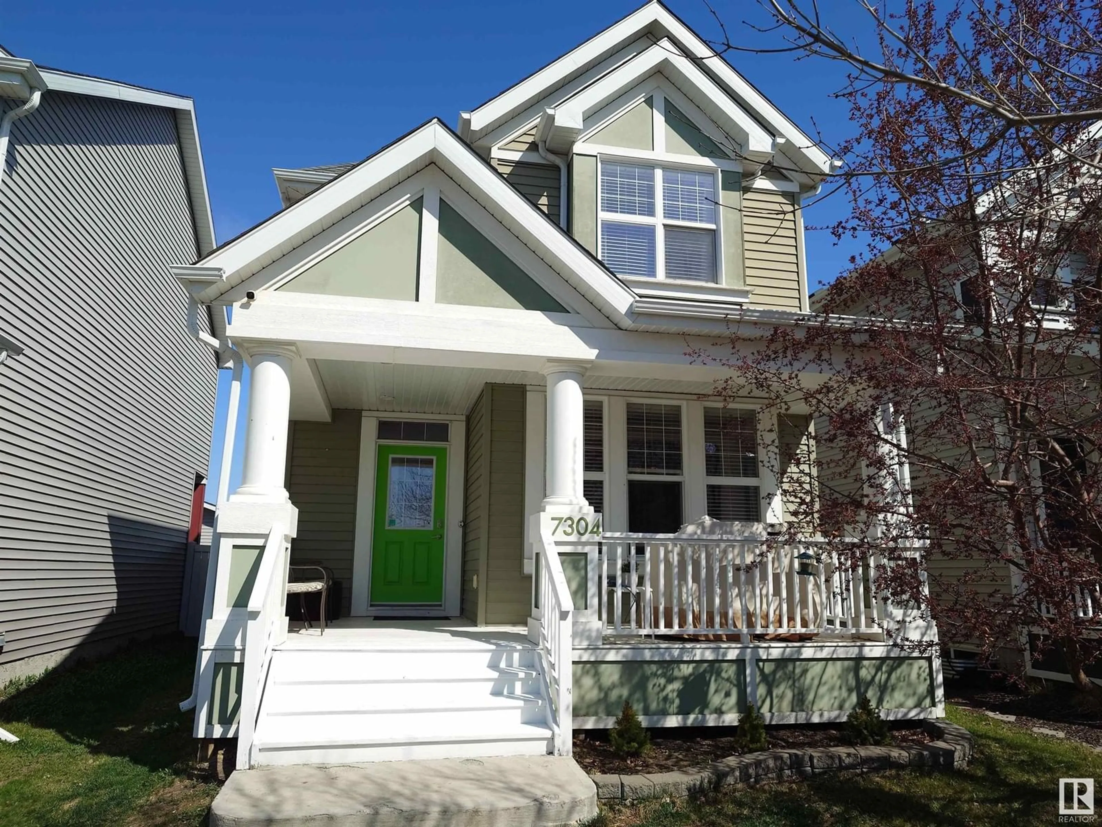 Home with vinyl exterior material, street for SW - 7304 20 AV, Edmonton Alberta T6X0L5