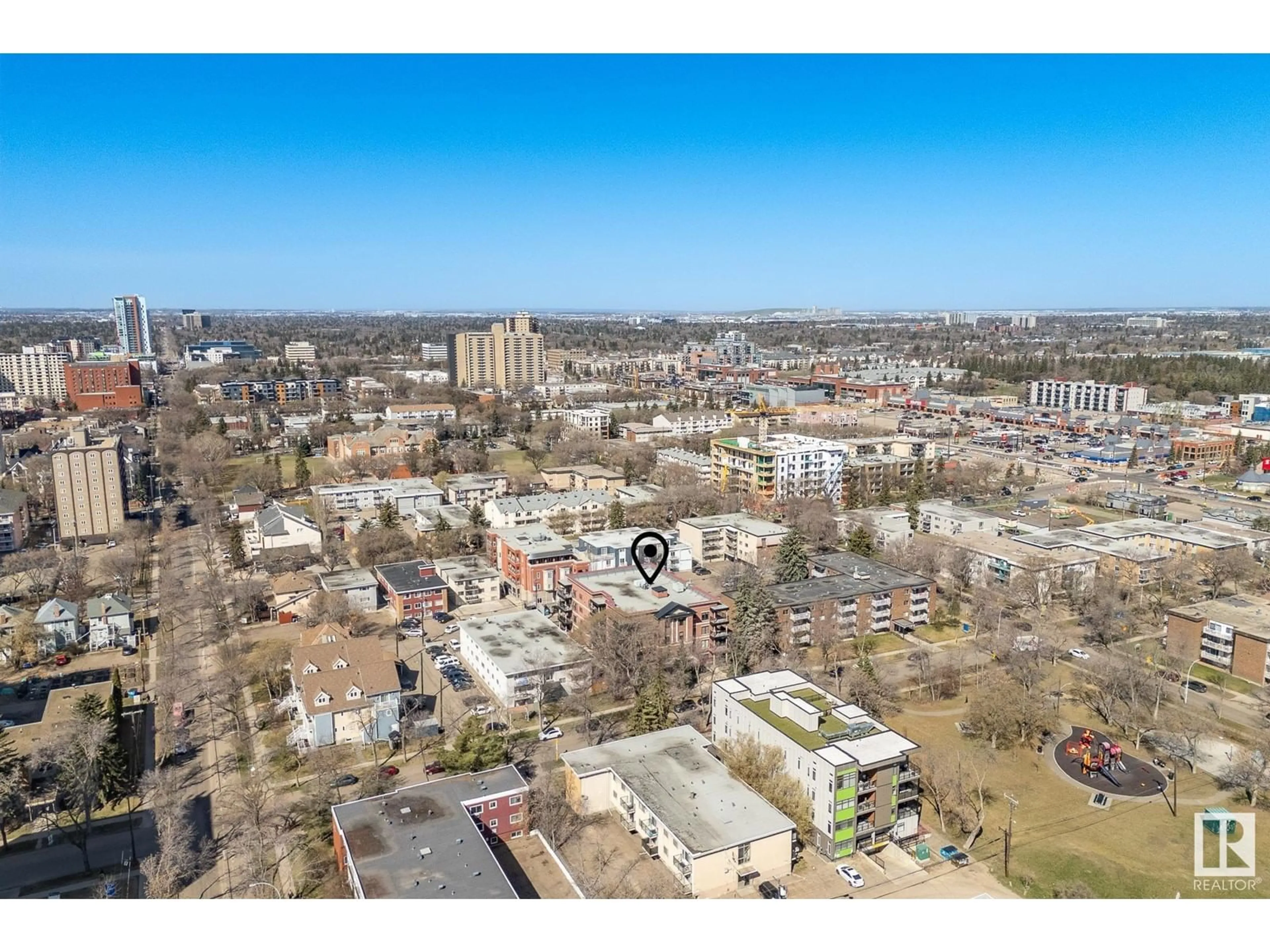 A pic from outside/outdoor area/front of a property/back of a property/a pic from drone, city buildings view from balcony for #104 - 10232 115 ST, Edmonton Alberta T5K1T8