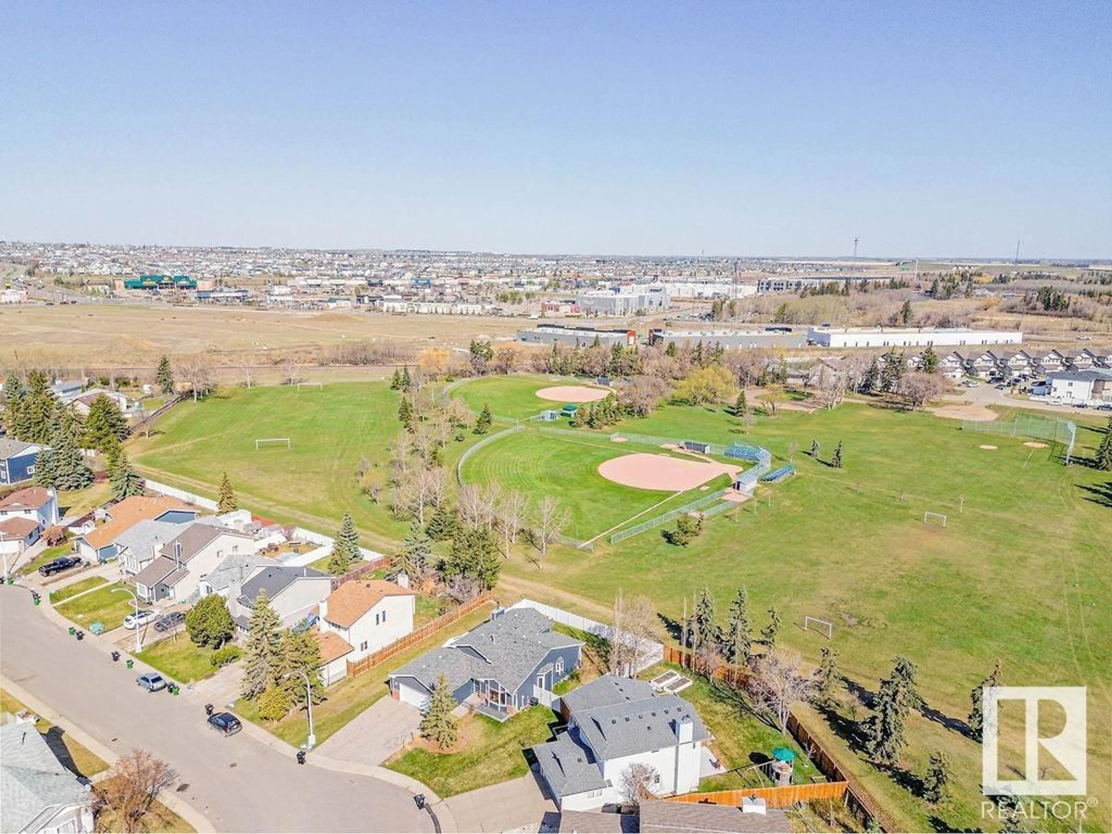 A pic from outside/outdoor area/front of a property/back of a property/a pic from drone, mountain view for 306 - 600 KIRKNESS RD, Edmonton Alberta T5Y2H5