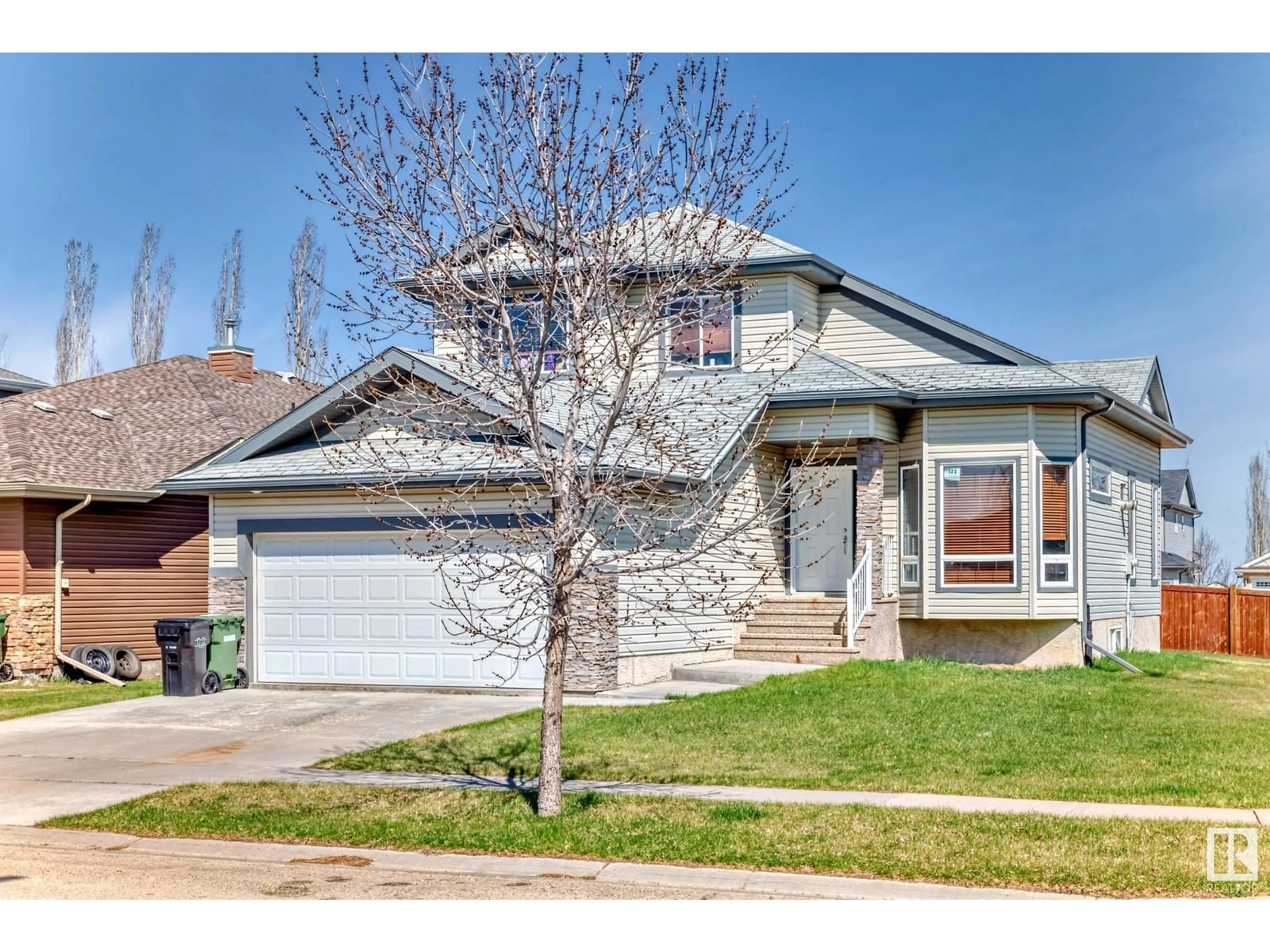 Home with brick exterior material, street for 123 SHORES DR, Leduc Alberta T9E0K9