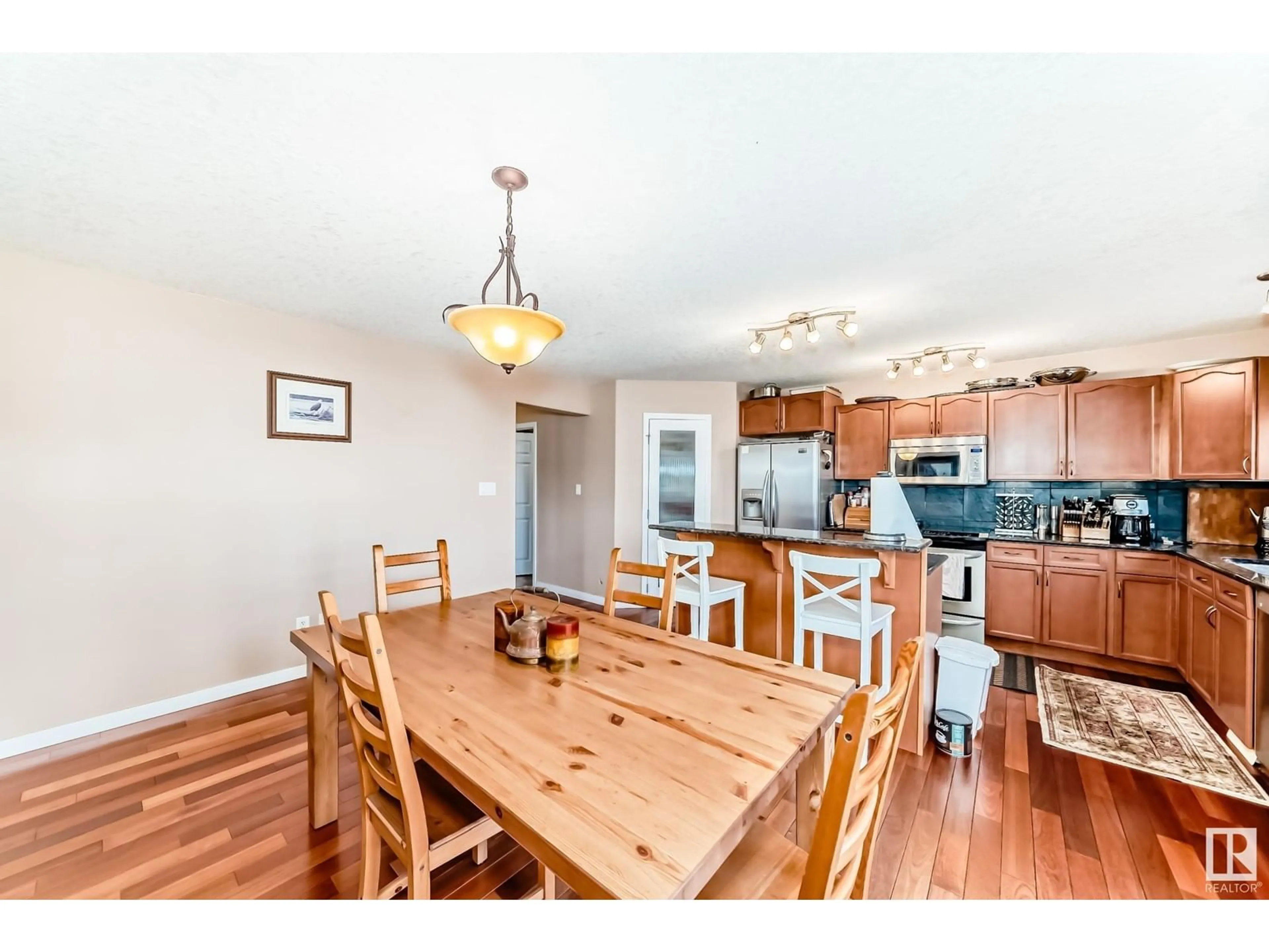Dining room, wood/laminate floor for 123 SHORES DR, Leduc Alberta T9E0K9
