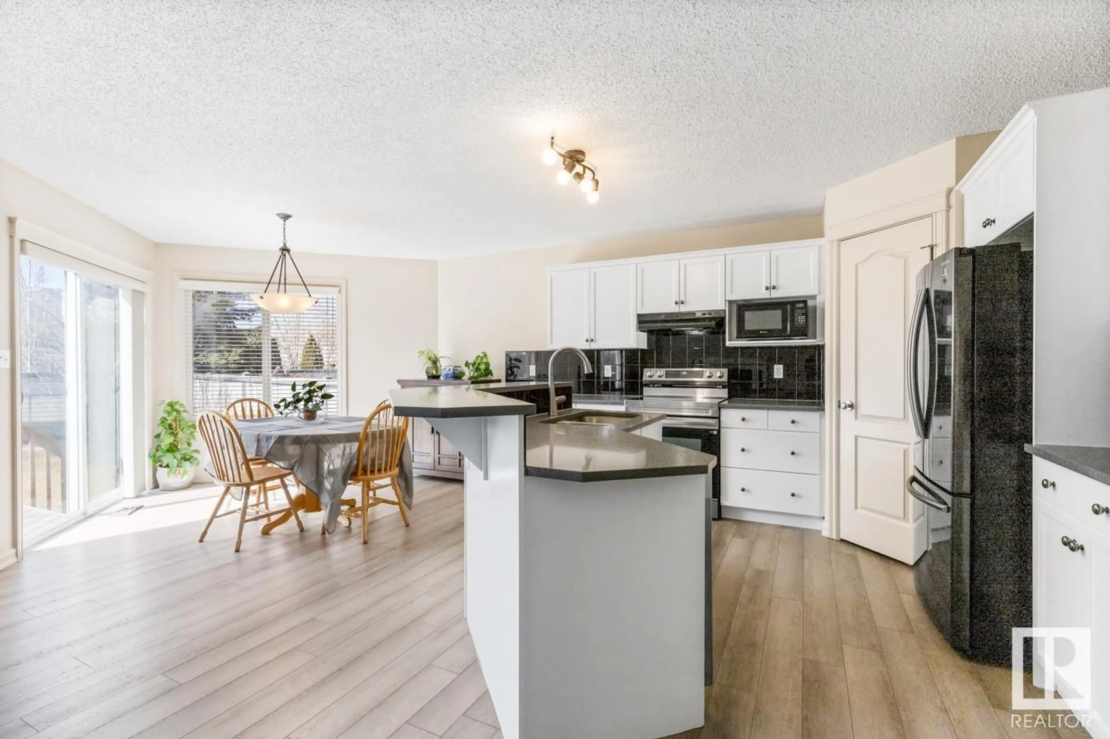 Open concept kitchen, unknown for 1116 84 ST, Edmonton Alberta T6X1E3