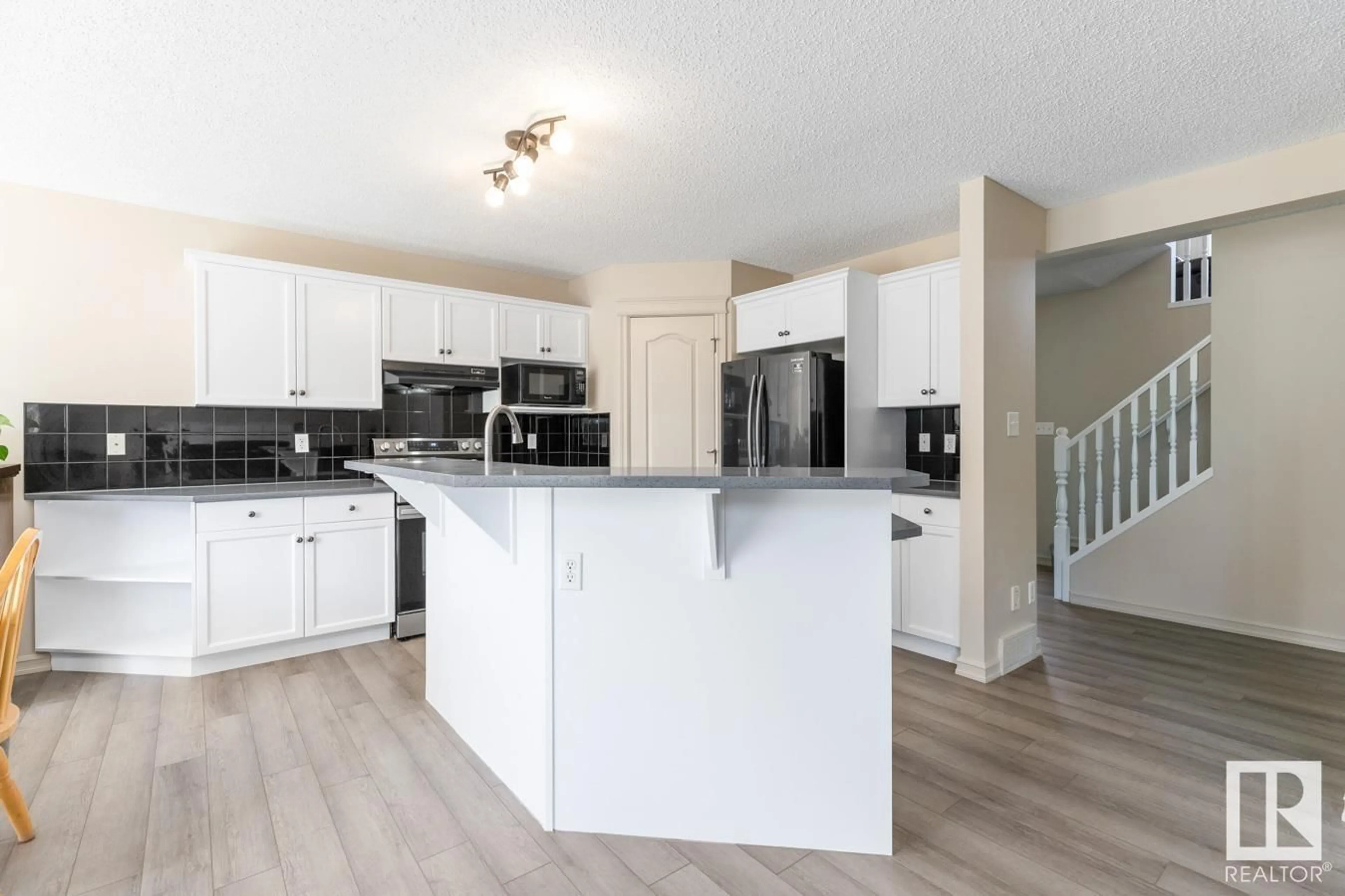 Open concept kitchen, unknown for 1116 84 ST, Edmonton Alberta T6X1E3
