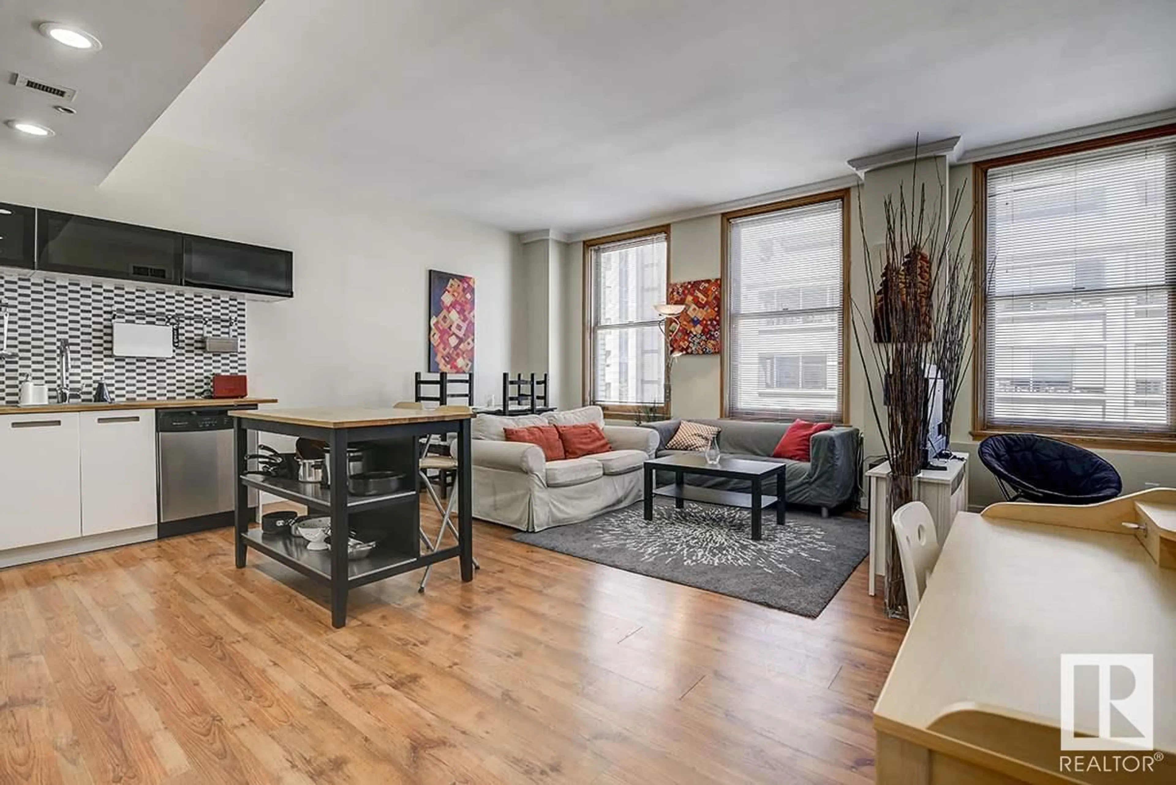 Living room with furniture, wood/laminate floor for 808 - 10134 100 ST, Edmonton Alberta T5J0N8