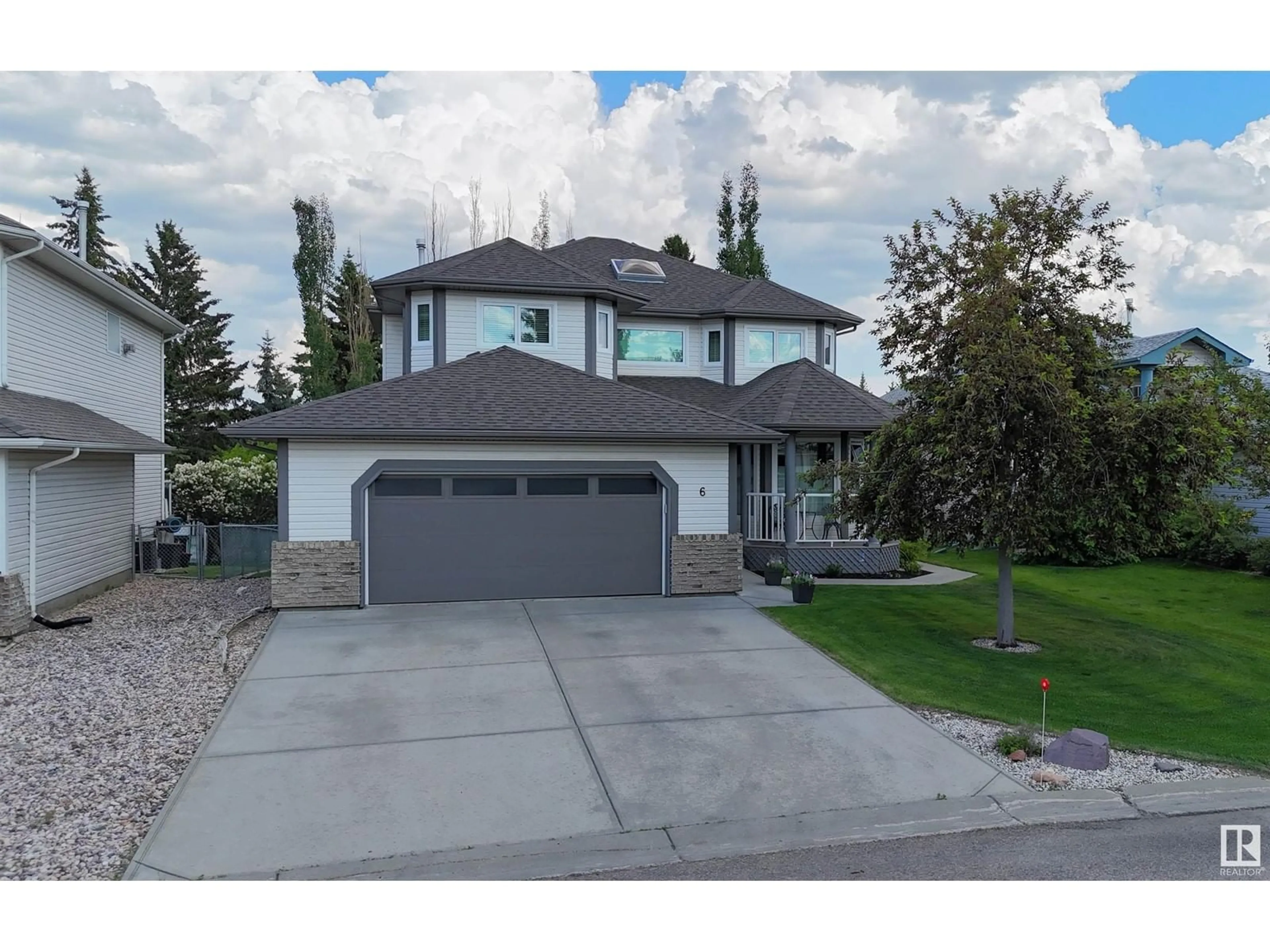 Home with vinyl exterior material, street for 6 LINKSIDE WY, Spruce Grove Alberta T7X4H7