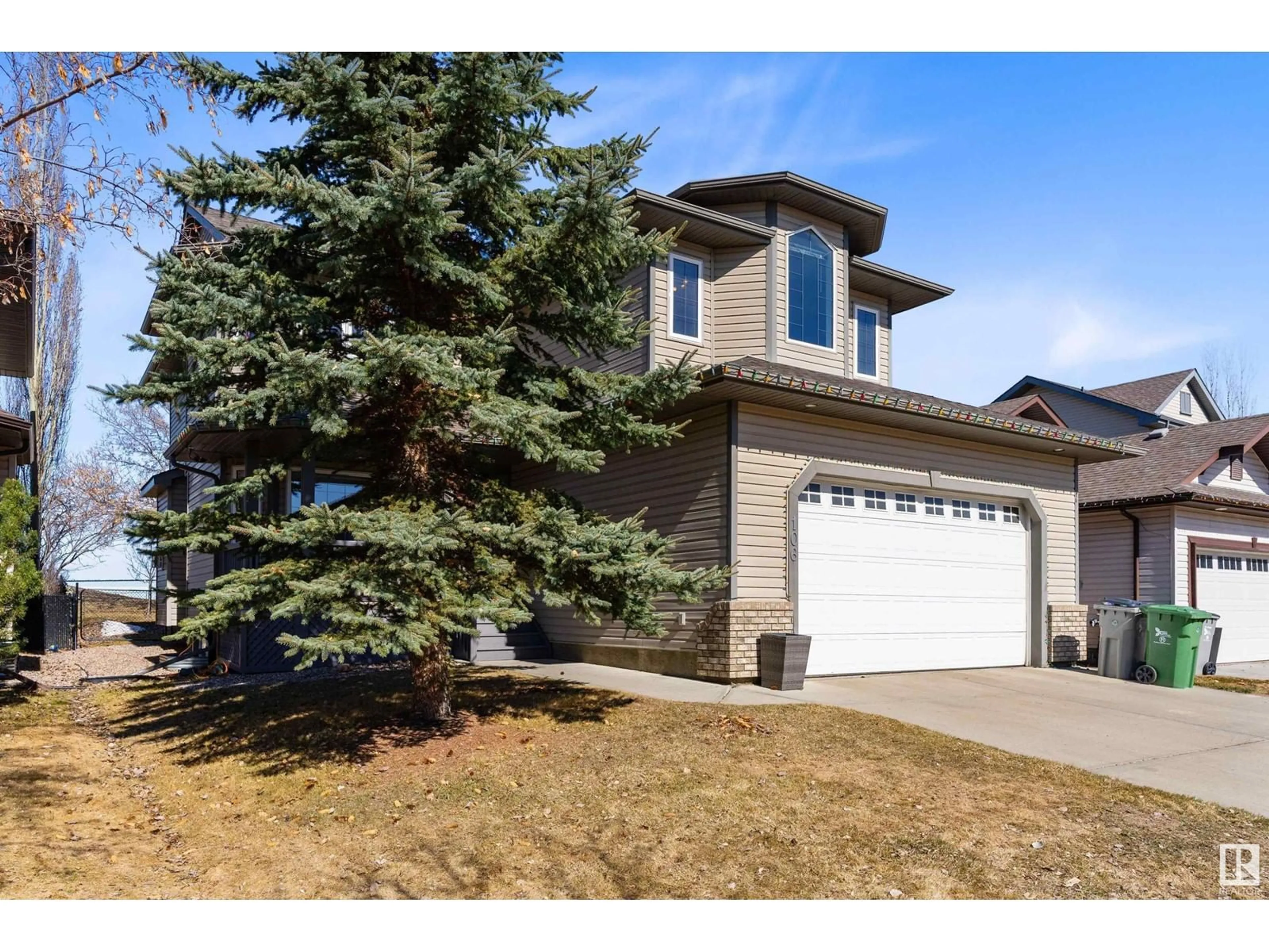 Home with vinyl exterior material, street for 106 RIDEAU CR, Beaumont Alberta T4X0B9