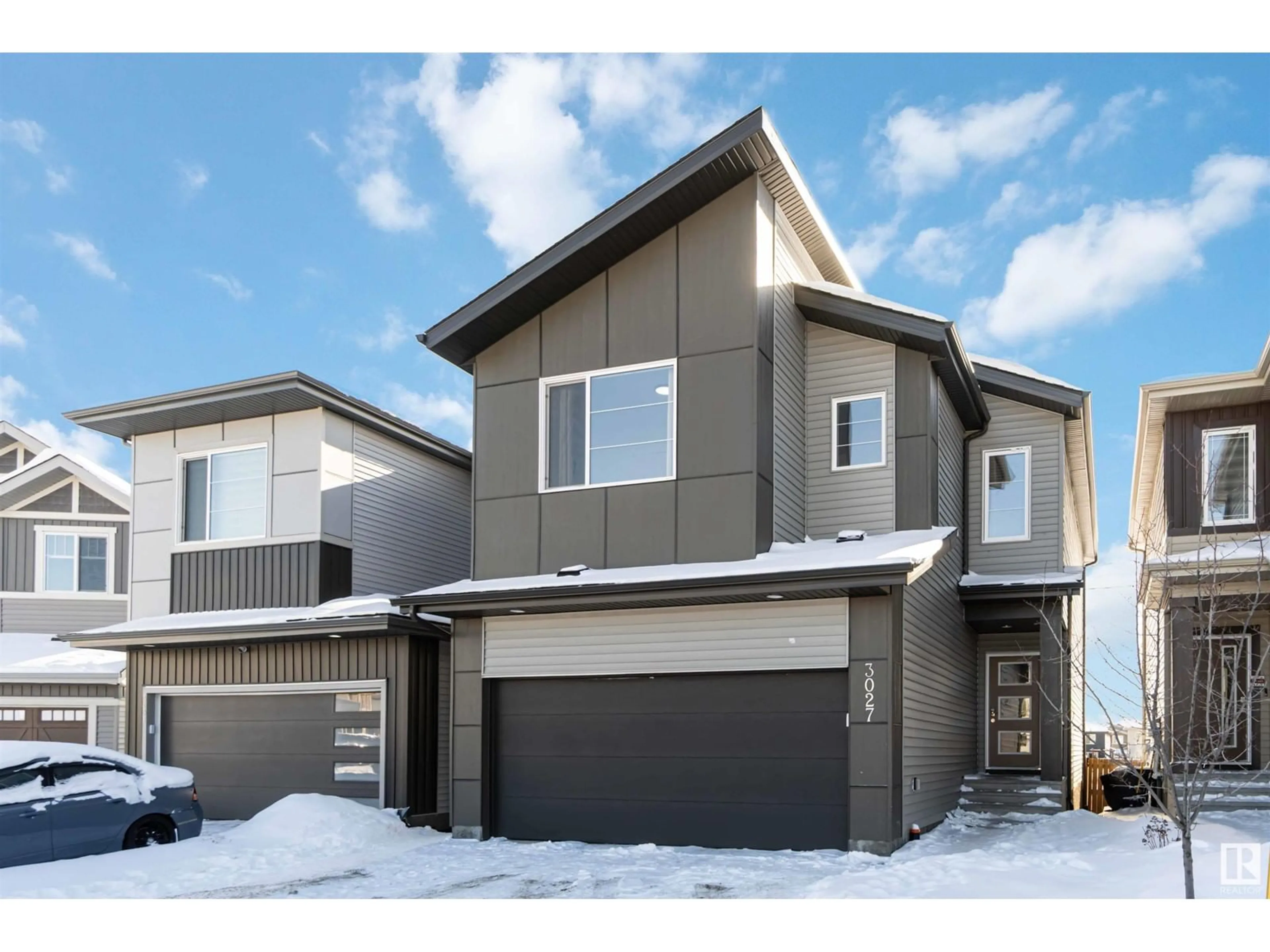 Home with vinyl exterior material, street for NW - 3027 200 ST, Edmonton Alberta T6M1N7