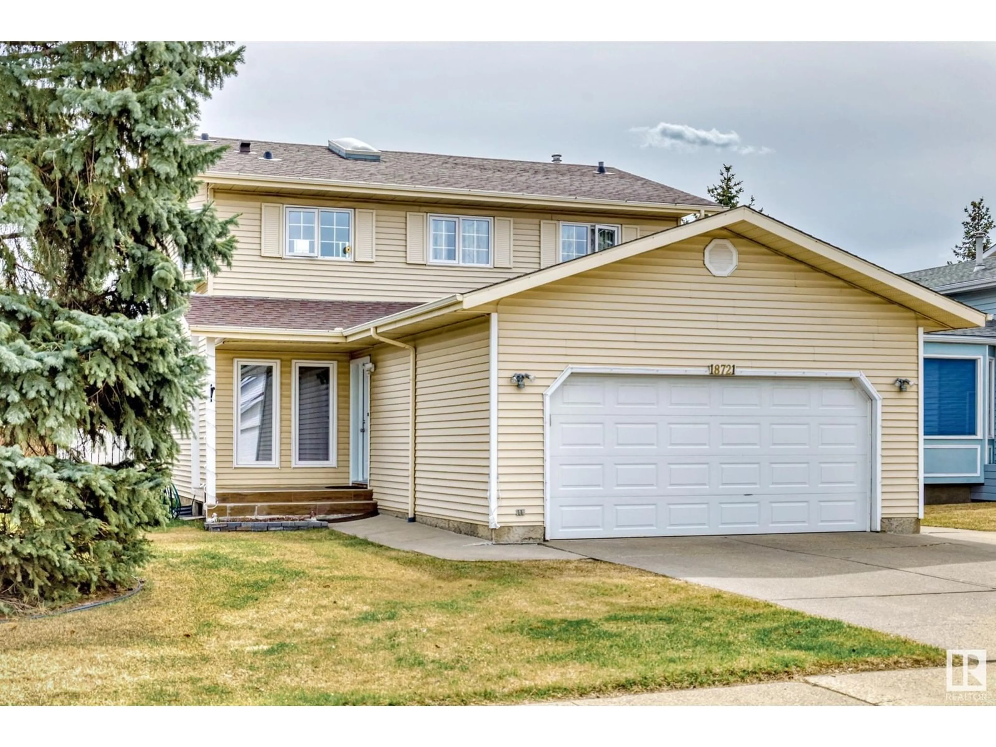 Home with vinyl exterior material, street for NW - 18721 70 AV, Edmonton Alberta T5T5C9