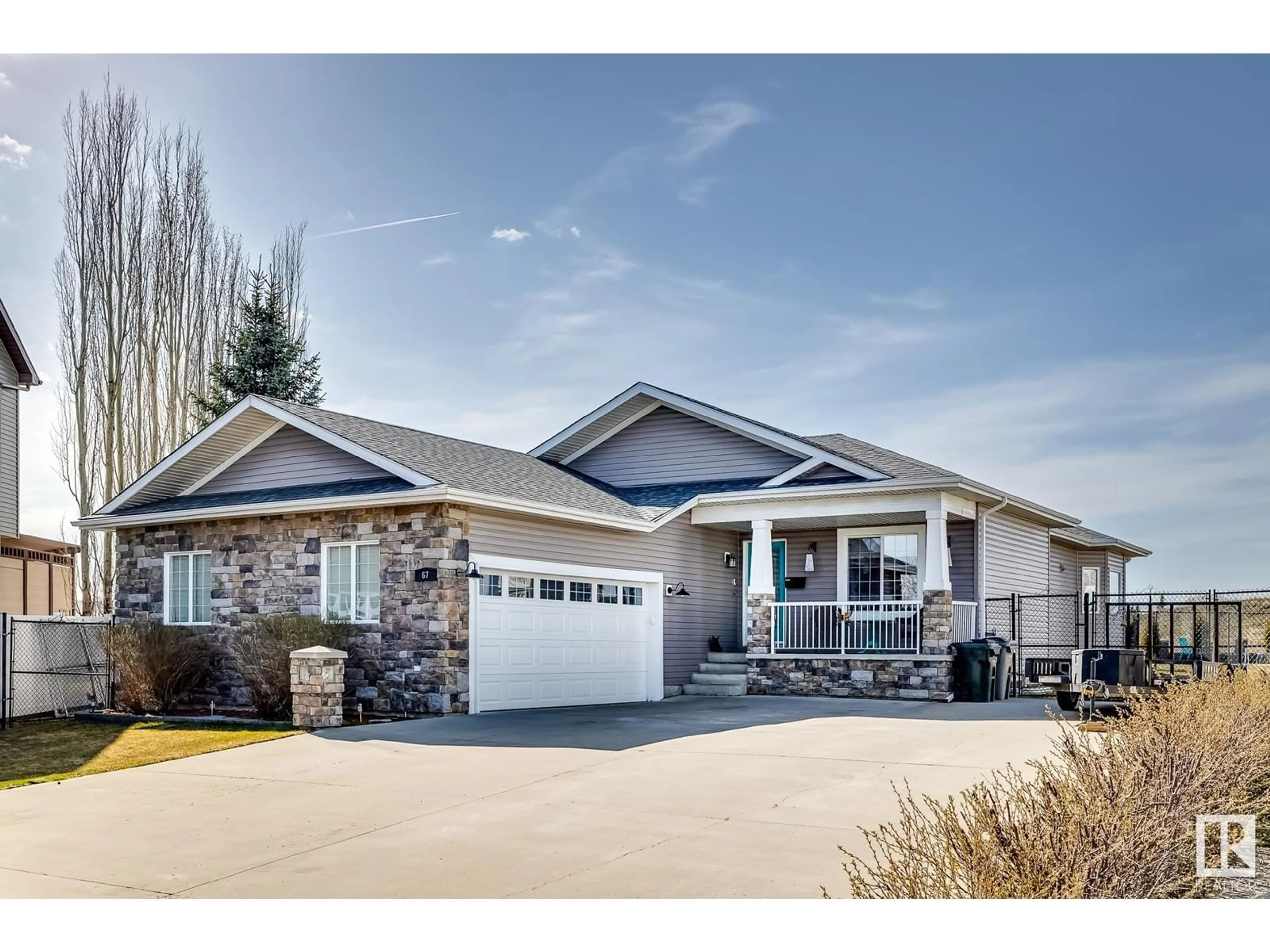 Home with vinyl exterior material, street for 67 BRIARWOOD PT, Stony Plain Alberta T7Z2Z2