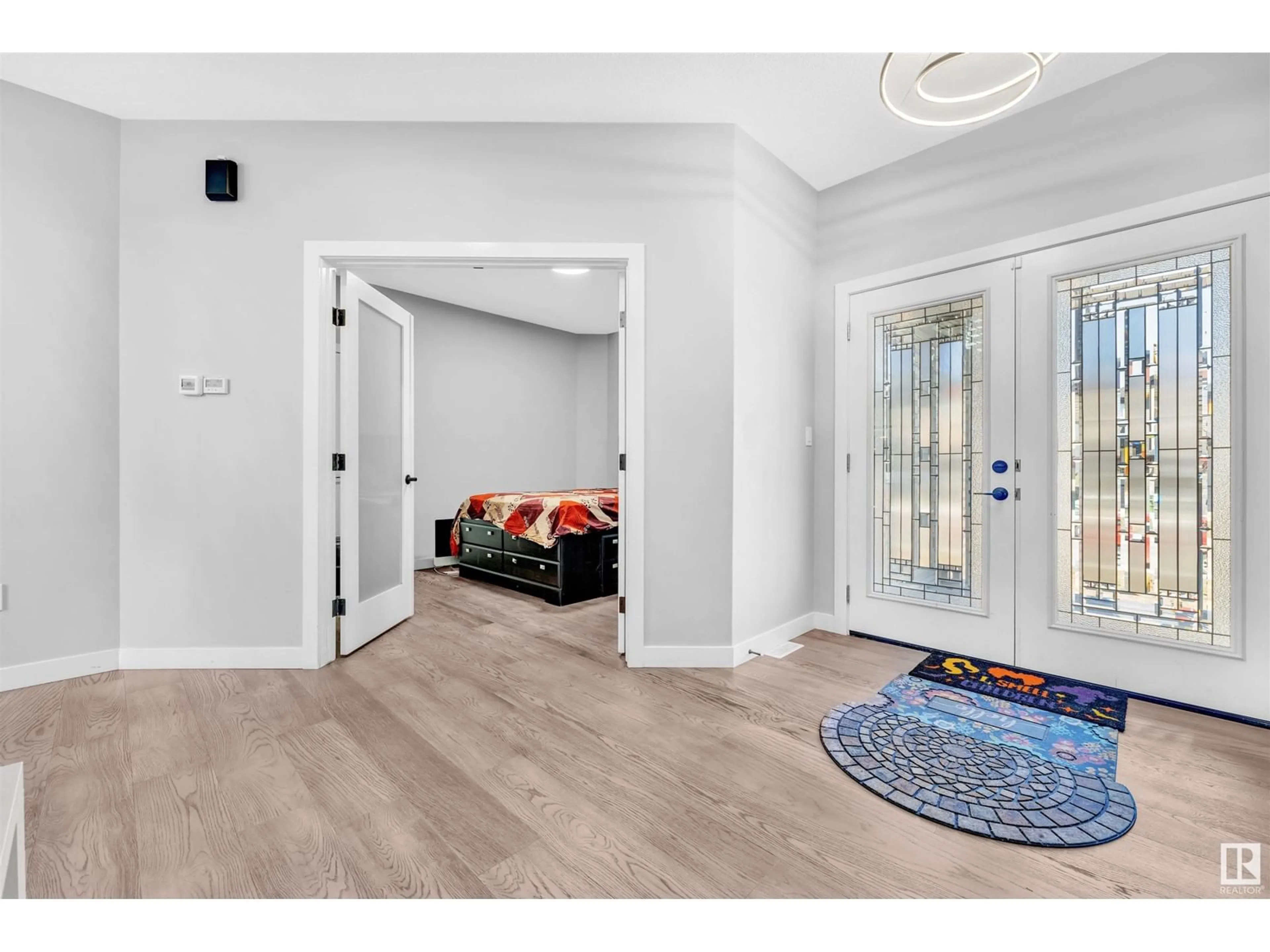 Indoor entryway for 1027 150 AV, Edmonton Alberta T5Y4C1