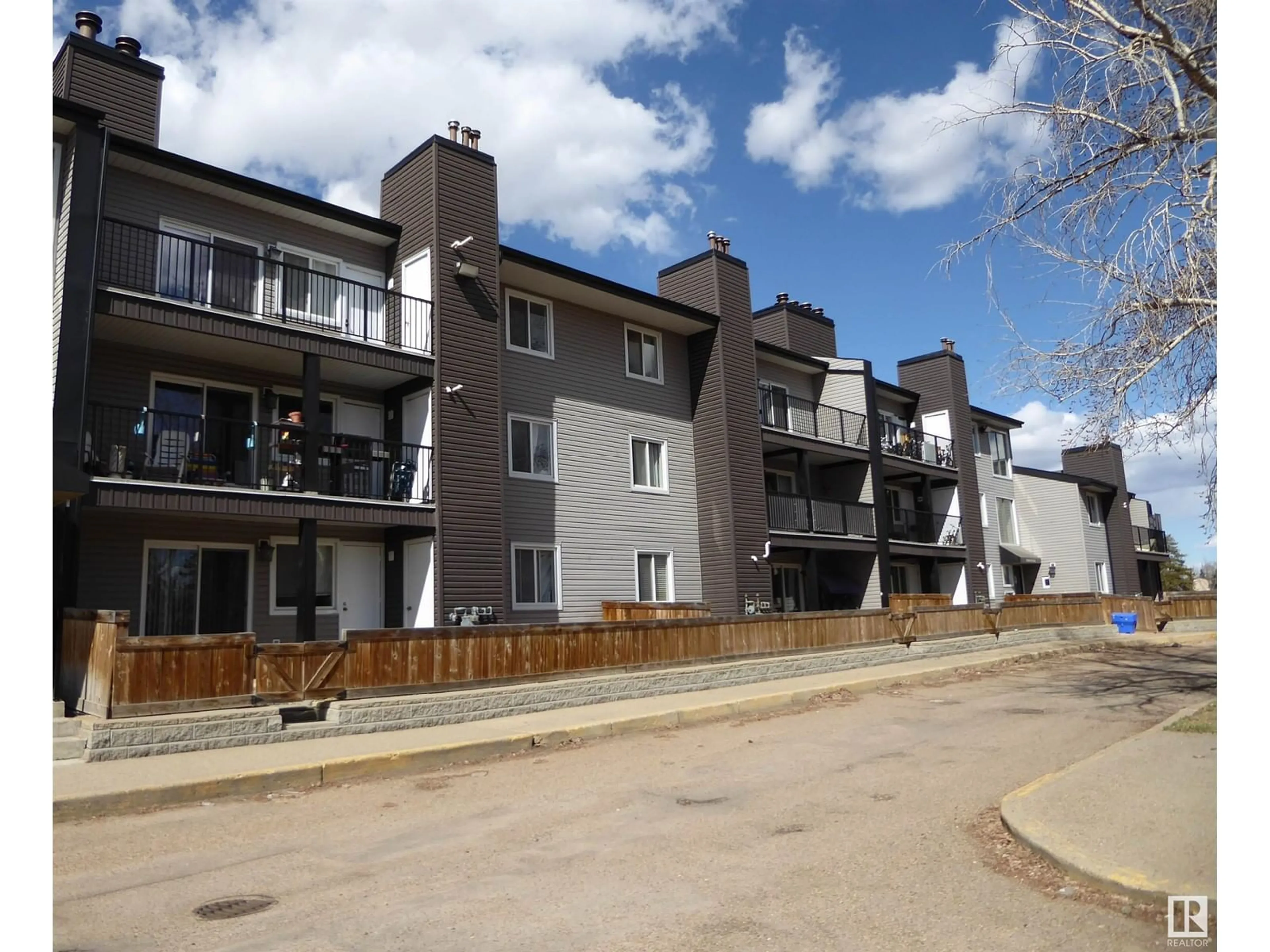 A pic from outside/outdoor area/front of a property/back of a property/a pic from drone, street for #305A - 12404 161 AV, Edmonton Alberta T5X4P4