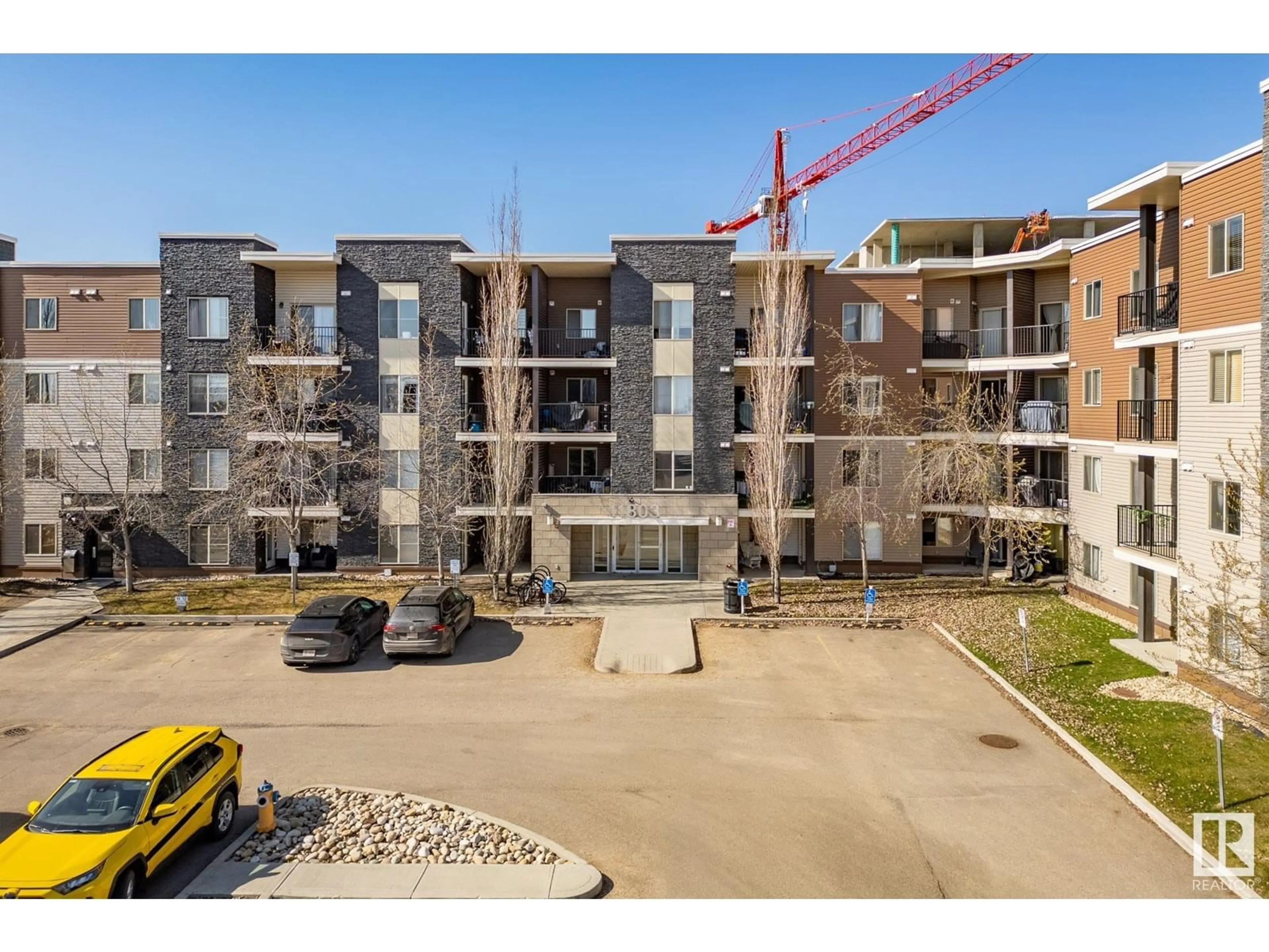 A pic from outside/outdoor area/front of a property/back of a property/a pic from drone, building for #107 - 11803 22 AV, Edmonton Alberta T6W2R9