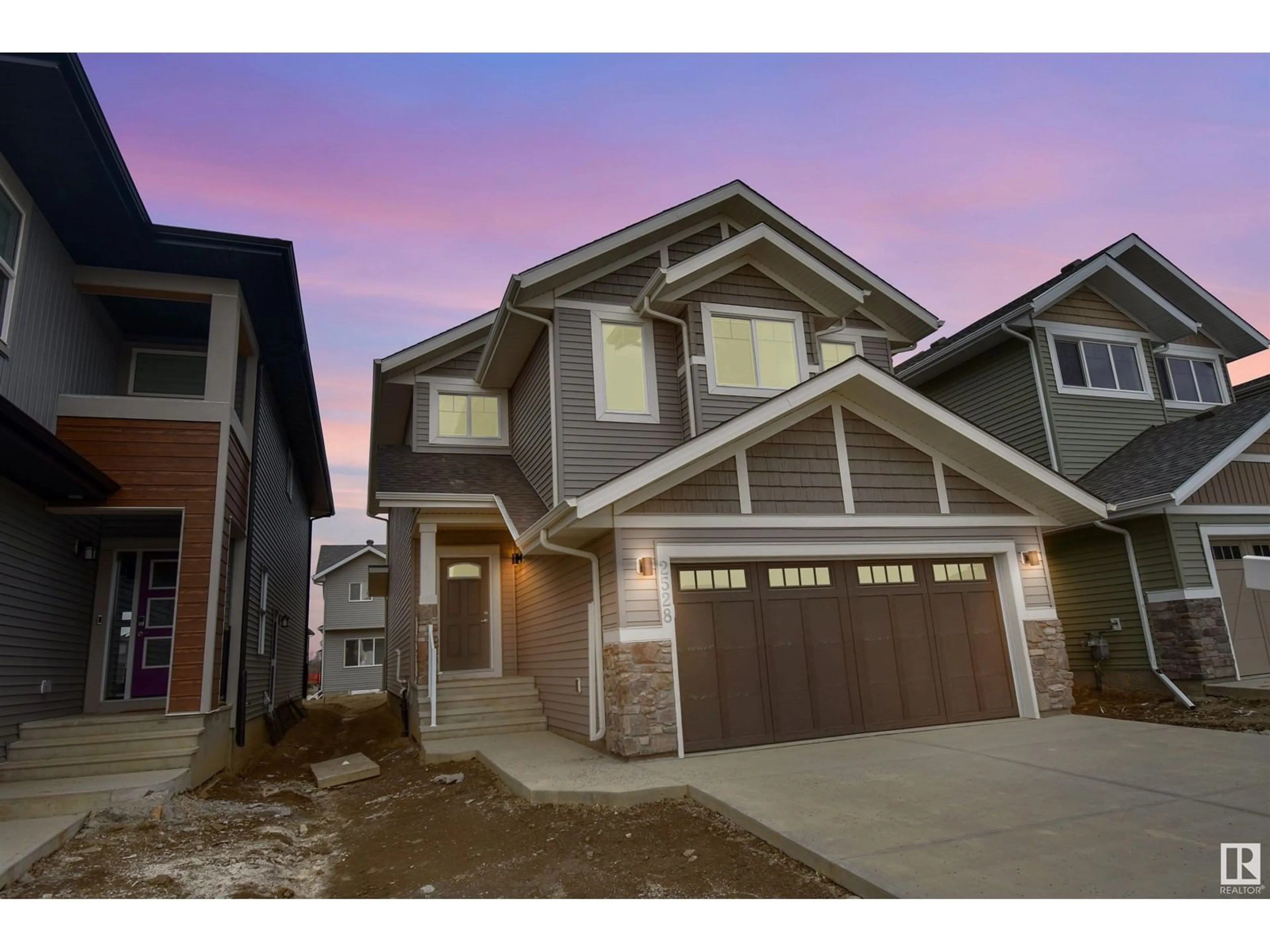 Home with vinyl exterior material, street for NW - 2528 209 ST, Edmonton Alberta T6M2K7